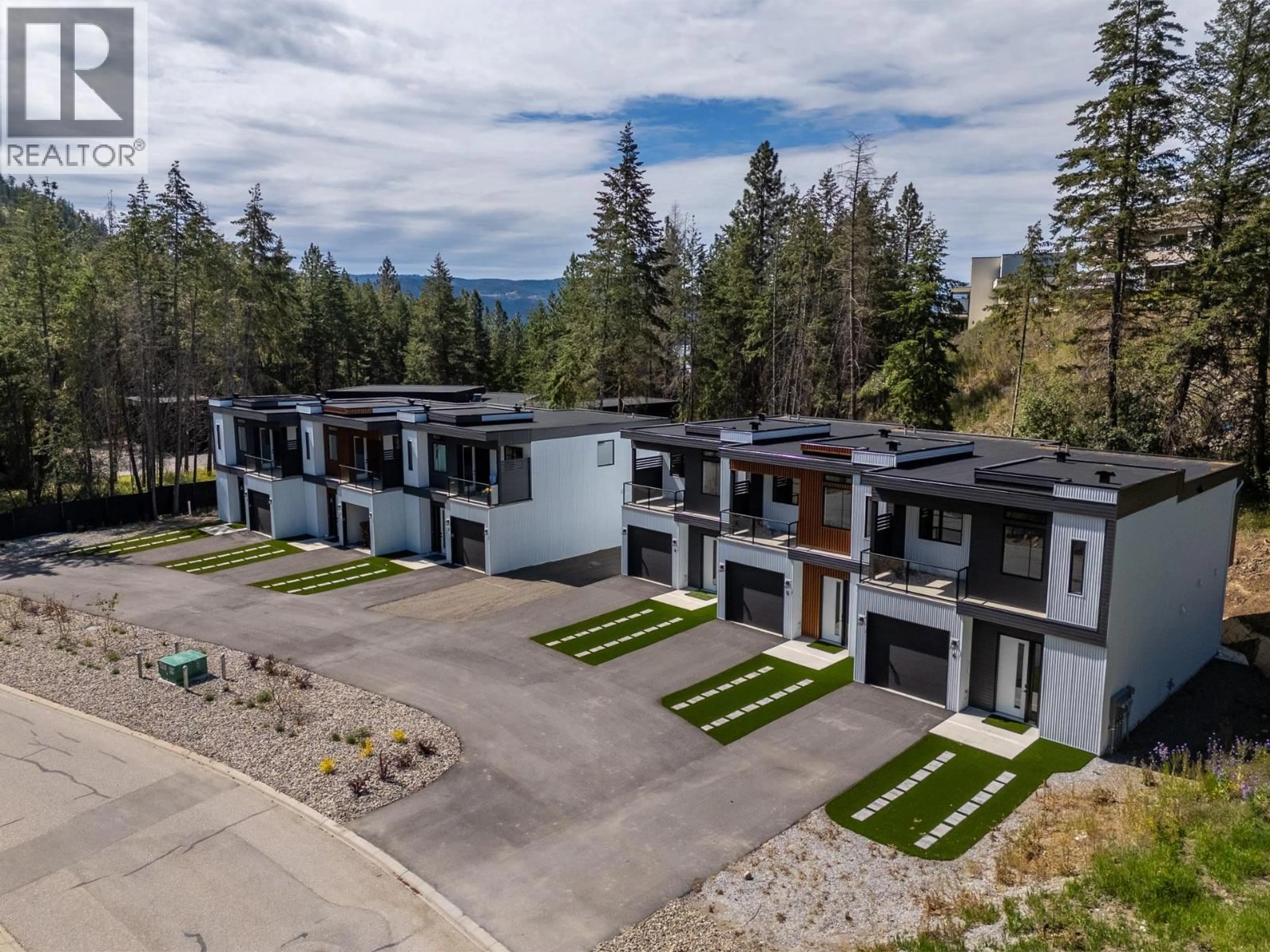 A pic from outside/outdoor area/front of a property/back of a property/a pic from drone, mountain view for 6 - 9188 TRONSON ROAD, Vernon British Columbia V1H1E2