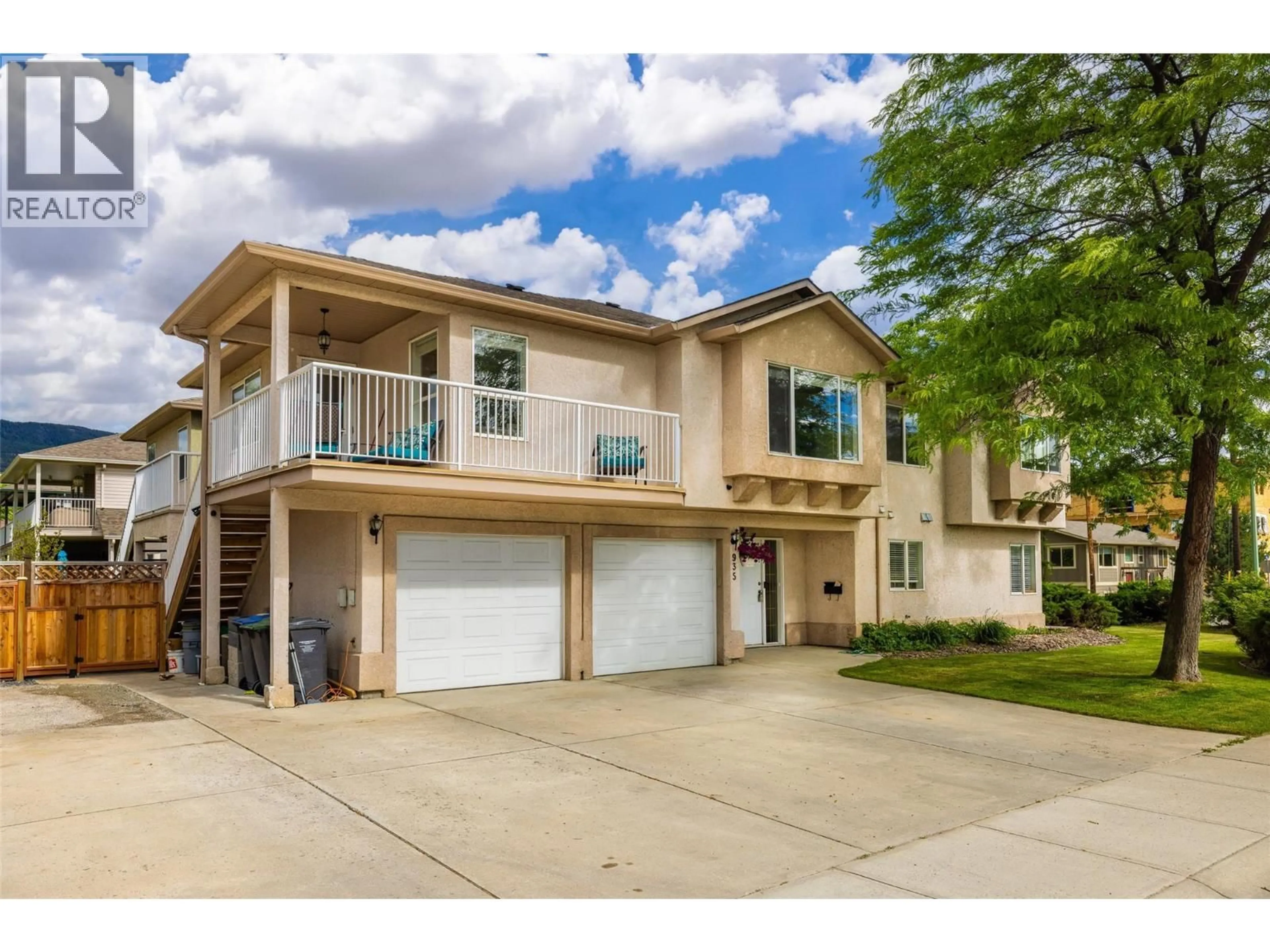 Home with vinyl exterior material, street for 935 MAYGARD ROAD, Kelowna British Columbia V1X5X1