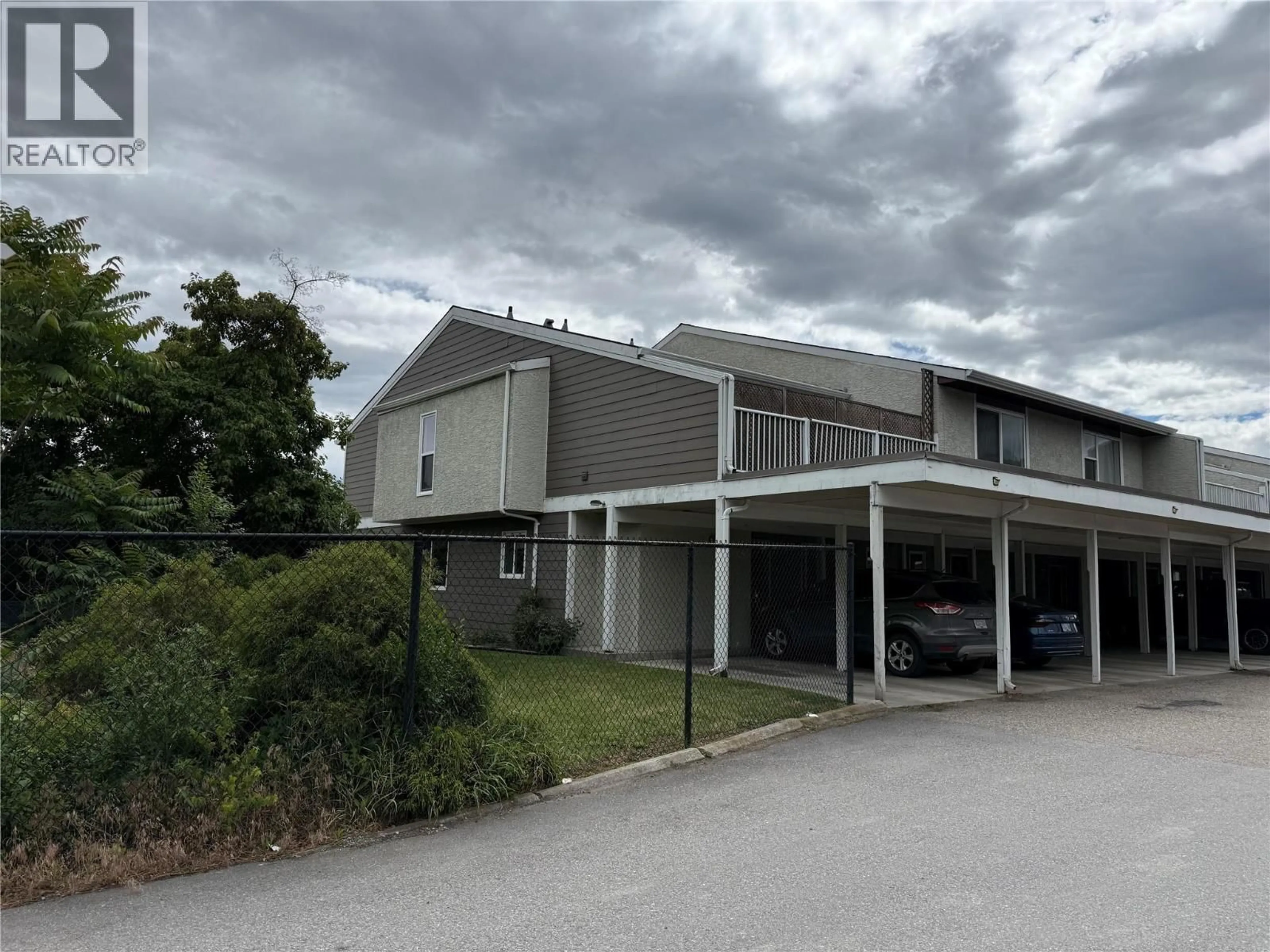 A pic from outside/outdoor area/front of a property/back of a property/a pic from drone, building for 1 - 500 LESTER ROAD, Kelowna British Columbia V1X6E2