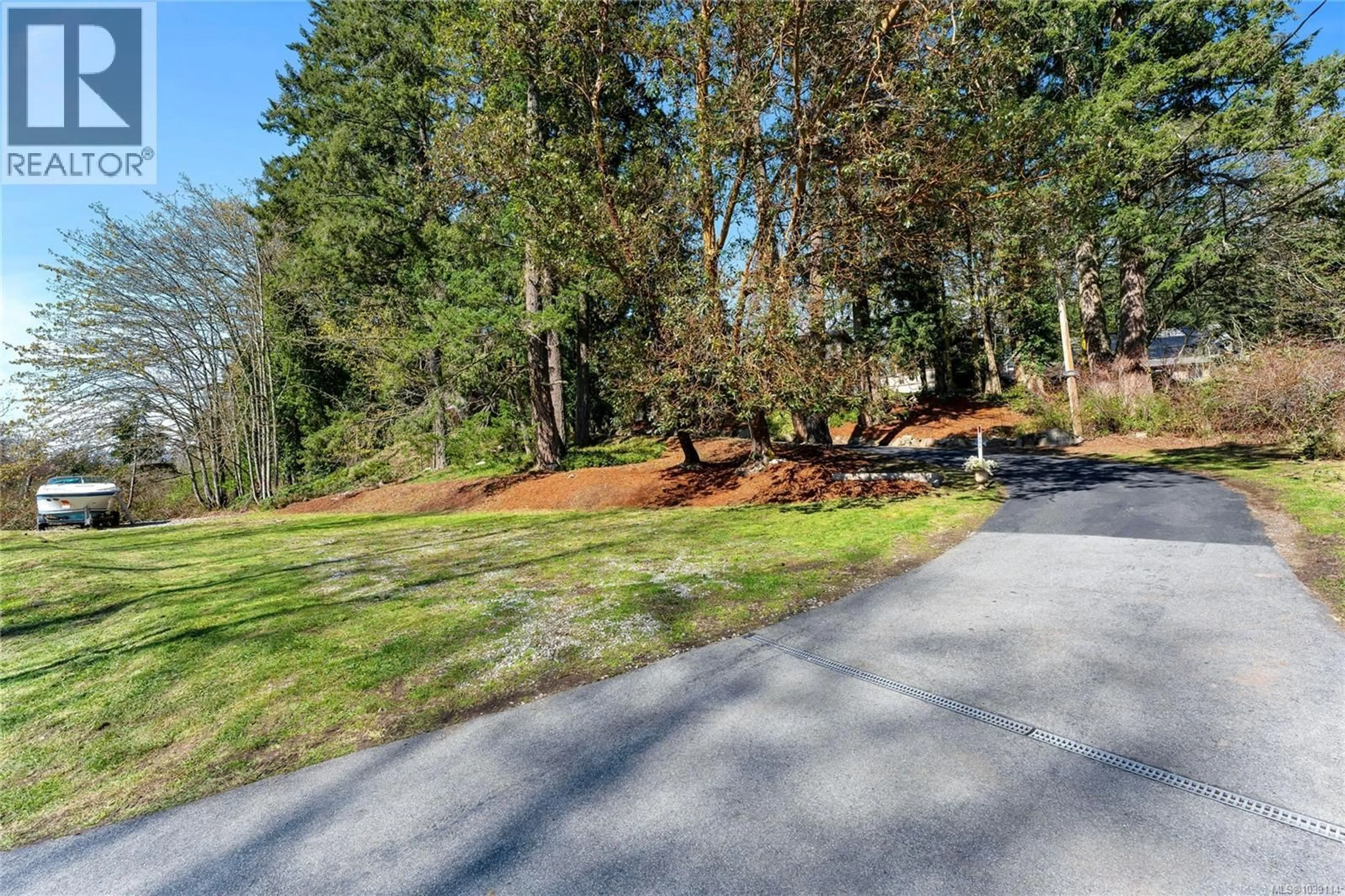A pic from outside/outdoor area/front of a property/back of a property/a pic from drone, forest/trees view for 1084 TATLOW ROAD, North Saanich British Columbia V8L5P3