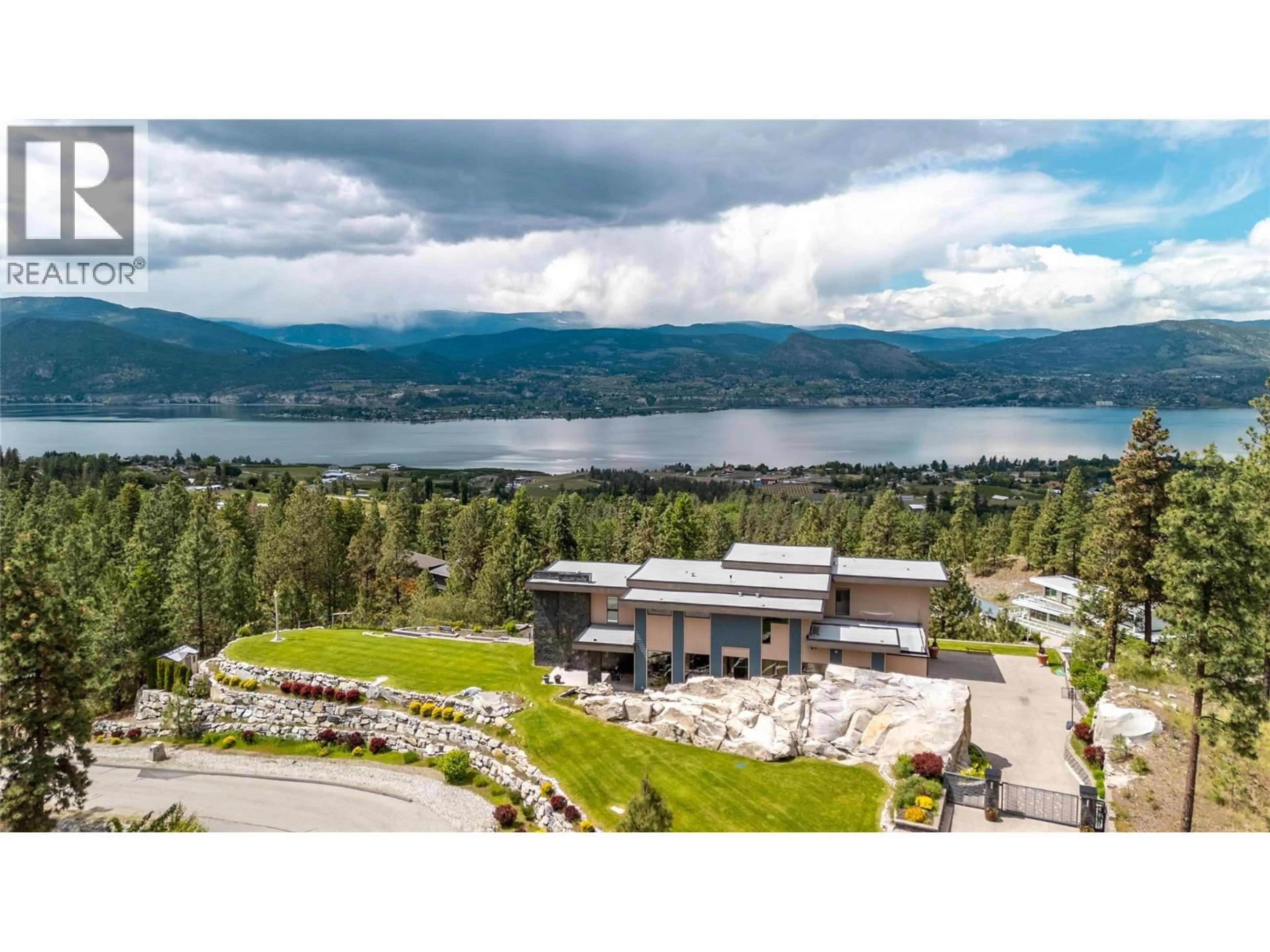 A pic from outside/outdoor area/front of a property/back of a property/a pic from drone, water/lake/river/ocean view for 121 FLAGSTONE RISE, Naramata British Columbia V0H1N1