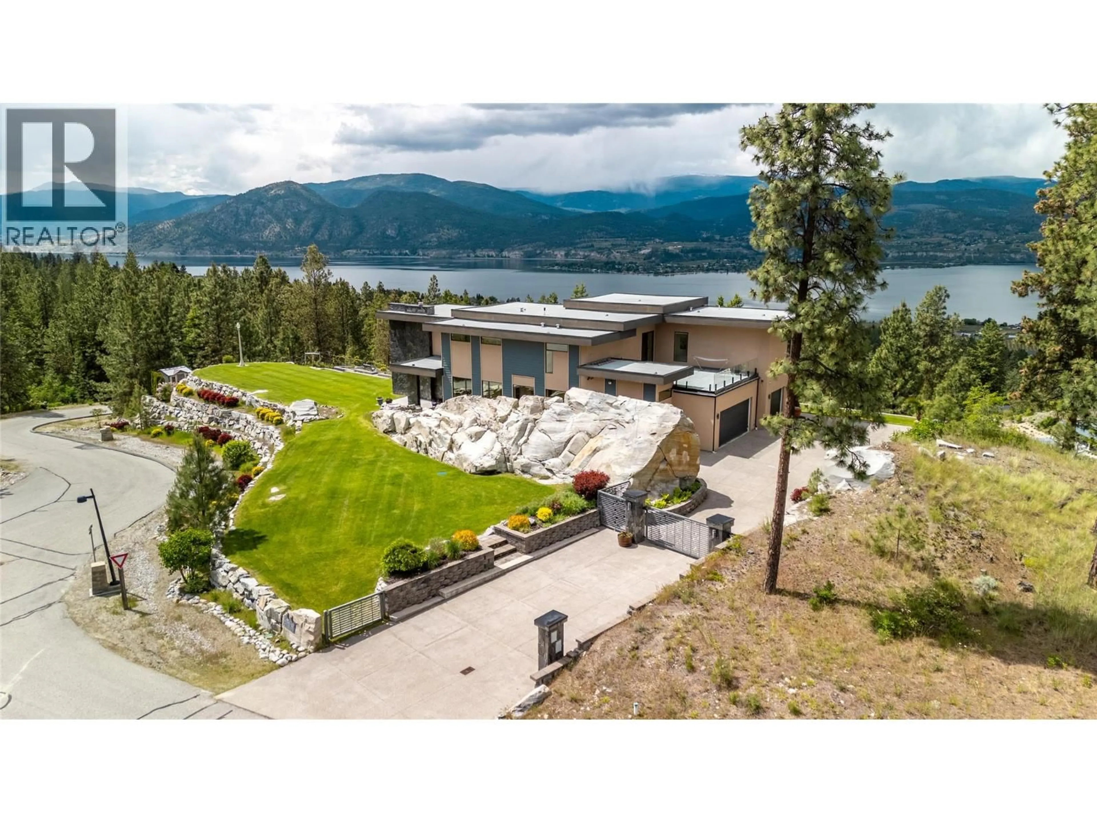 A pic from outside/outdoor area/front of a property/back of a property/a pic from drone, water/lake/river/ocean view for 121 FLAGSTONE RISE, Naramata British Columbia V0H1N1