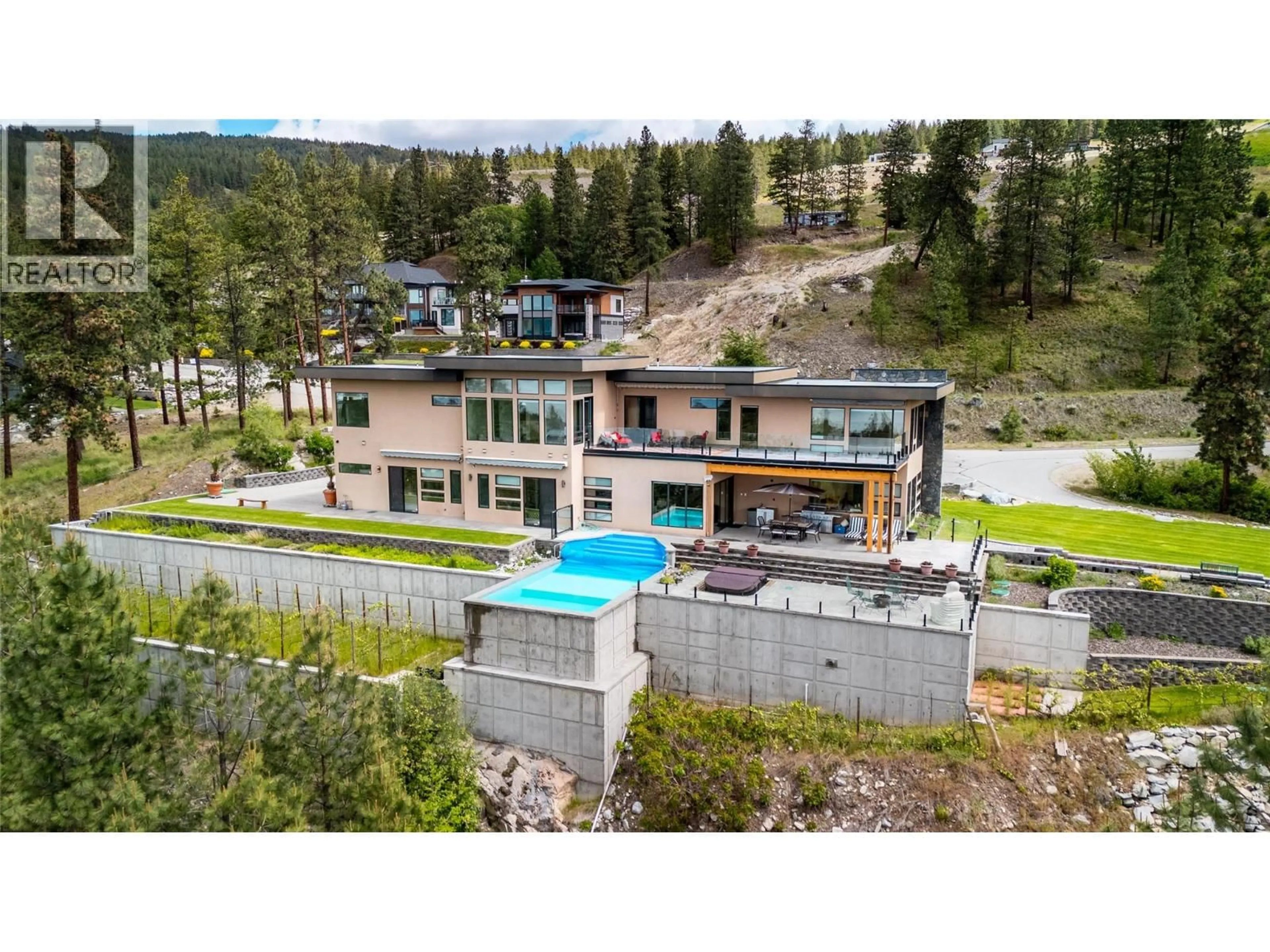 A pic from outside/outdoor area/front of a property/back of a property/a pic from drone, mountain view for 121 FLAGSTONE RISE, Naramata British Columbia V0H1N1