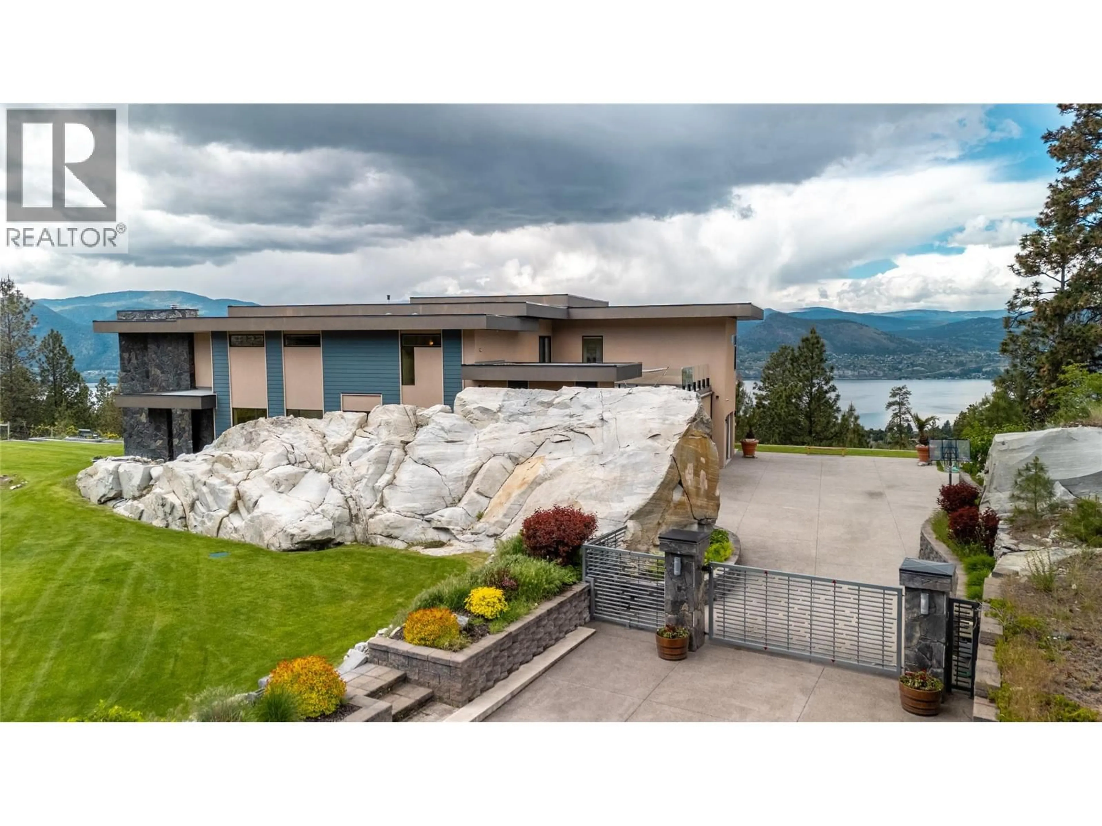 A pic from outside/outdoor area/front of a property/back of a property/a pic from drone, water/lake/river/ocean view for 121 FLAGSTONE RISE, Naramata British Columbia V0H1N1