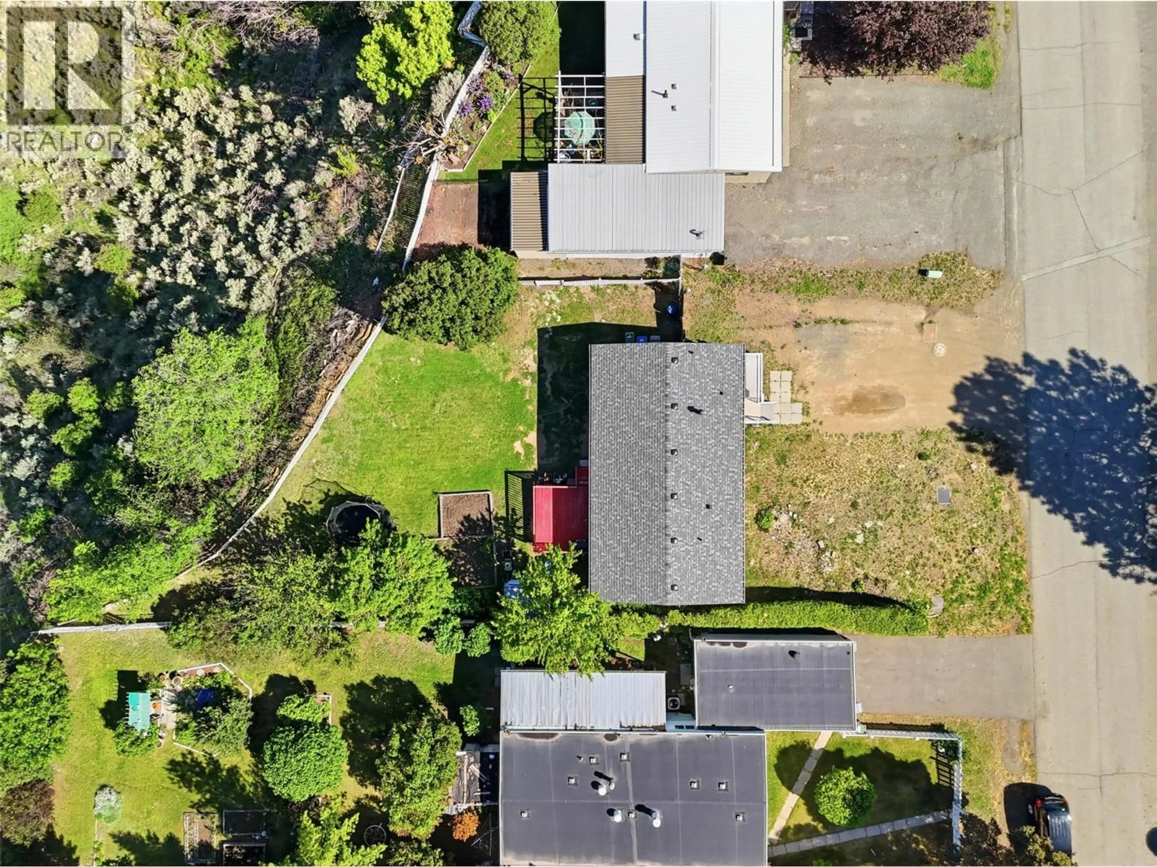 A pic from outside/outdoor area/front of a property/back of a property/a pic from drone, street for 779 KLAHANIE DRIVE, Kamloops British Columbia V2C5R1