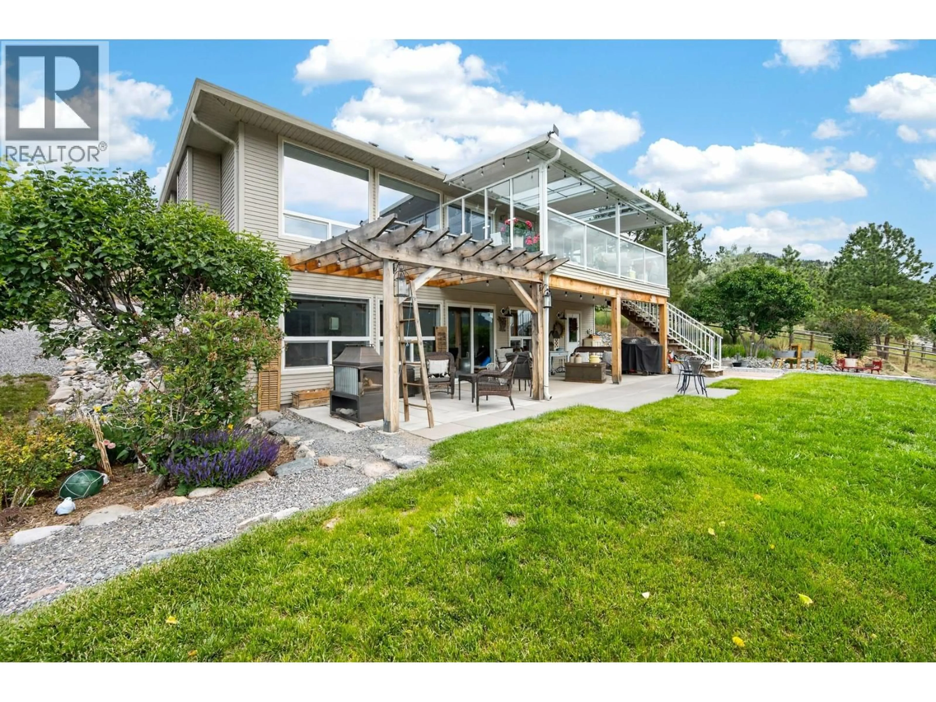 A pic from outside/outdoor area/front of a property/back of a property/a pic from drone, unknown for 1373 MILLER ROAD, Merritt British Columbia V1K1N6