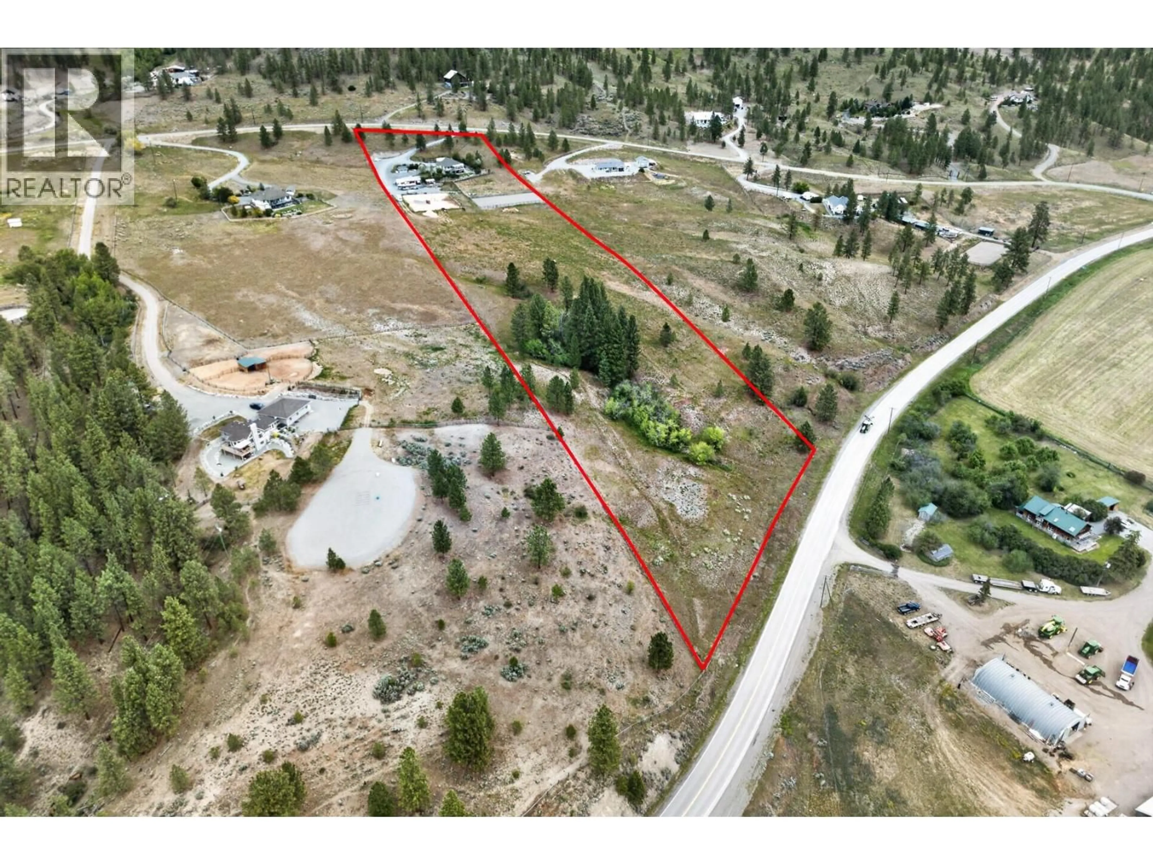 A pic from outside/outdoor area/front of a property/back of a property/a pic from drone, street for 1373 MILLER ROAD, Merritt British Columbia V1K1N6