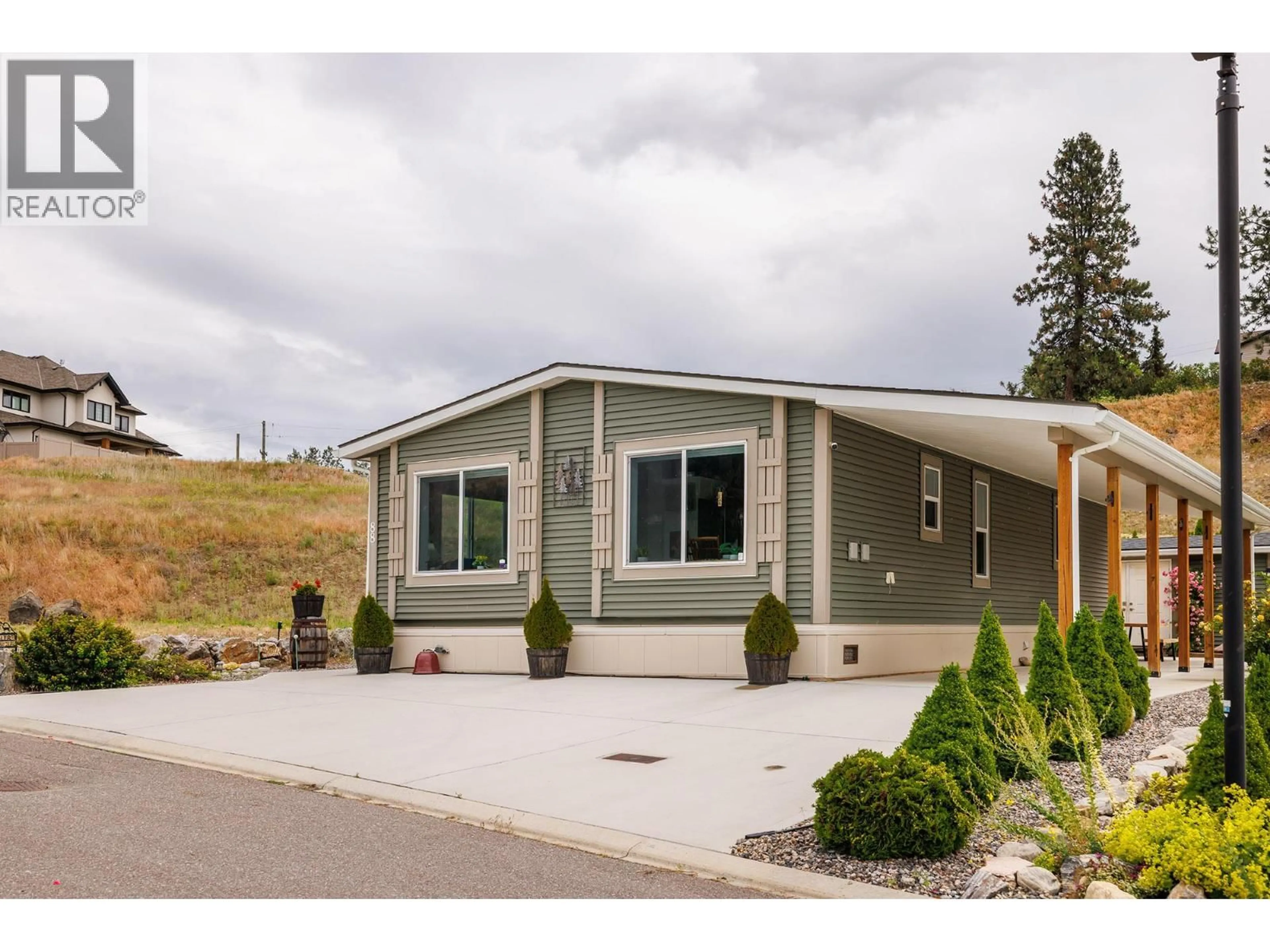 Home with vinyl exterior material, street for 88 - 1835 NANCEE WAY COURT, Kelowna British Columbia V1Z4C1