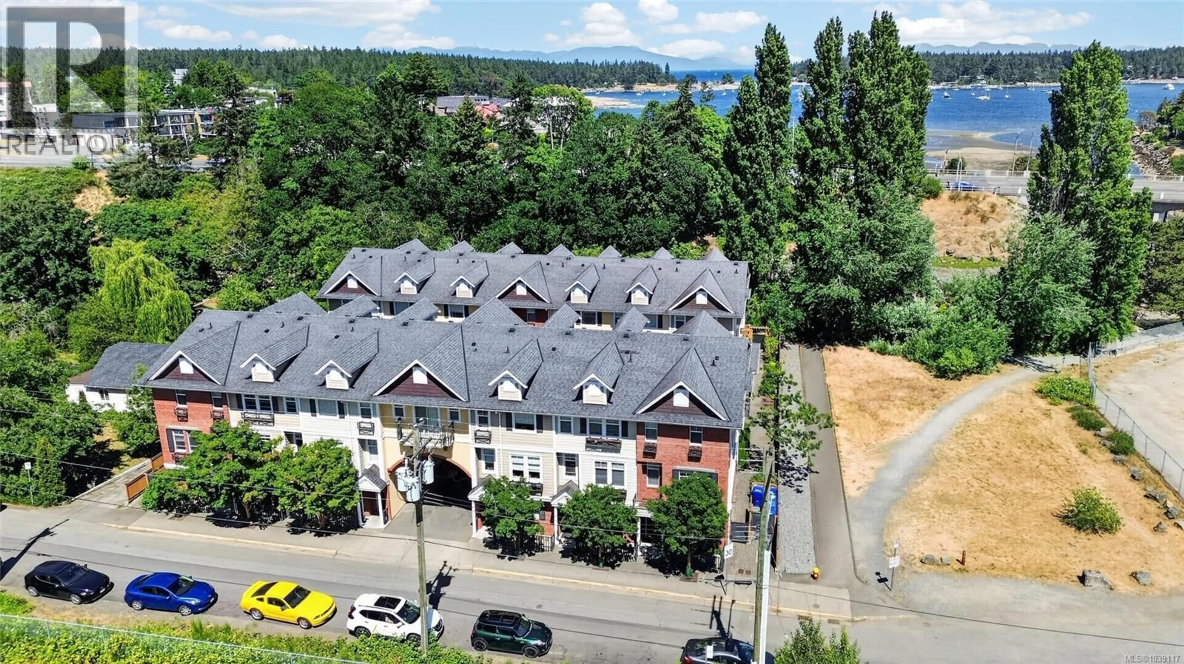 A pic from outside/outdoor area/front of a property/back of a property/a pic from drone, city buildings view from balcony for 109 - 50 MILL STREET, Nanaimo British Columbia V9R5A6