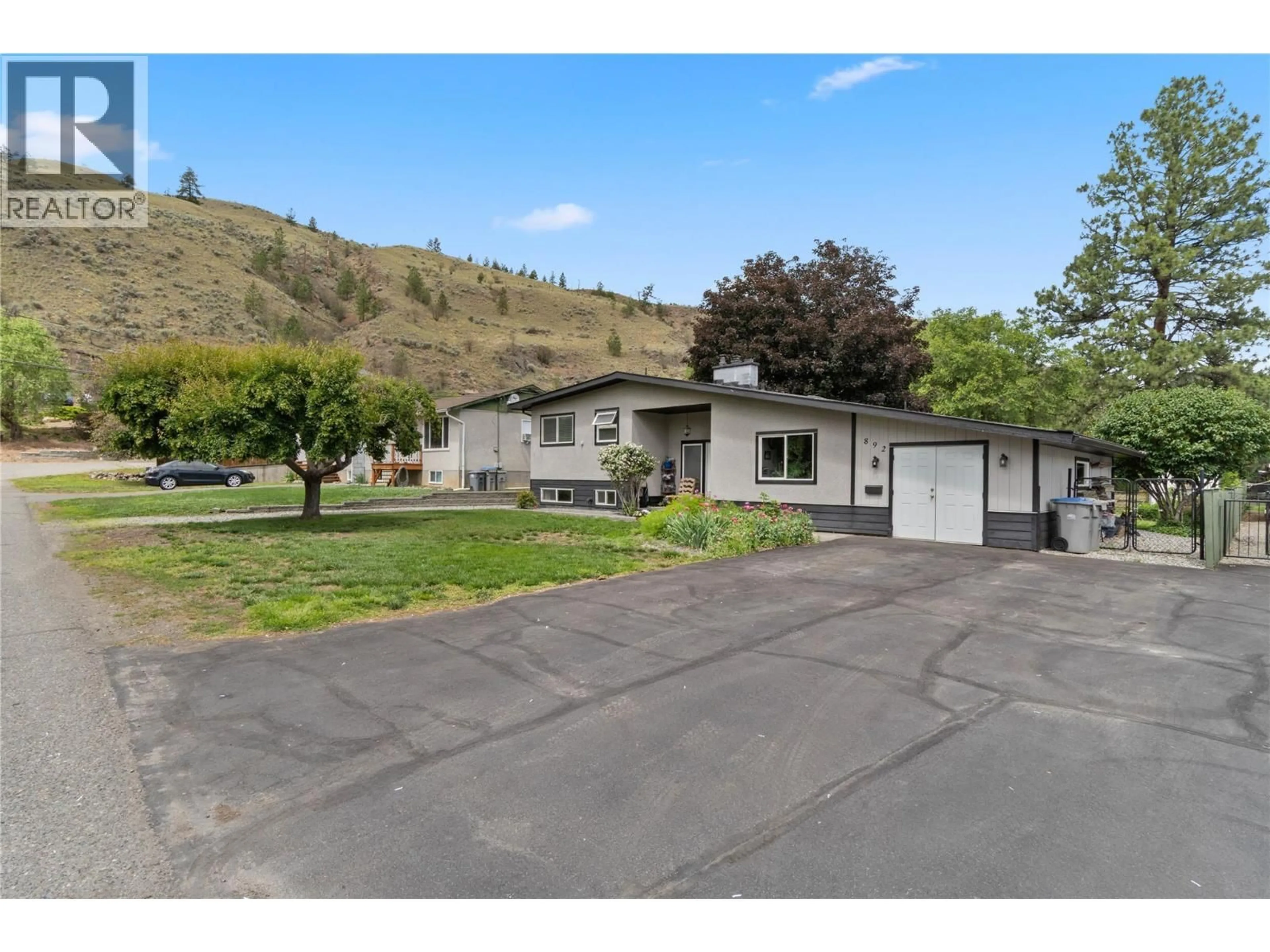 A pic from outside/outdoor area/front of a property/back of a property/a pic from drone, mountain view for 892 CRAMOND ROAD, Kamloops British Columbia V2B6J9