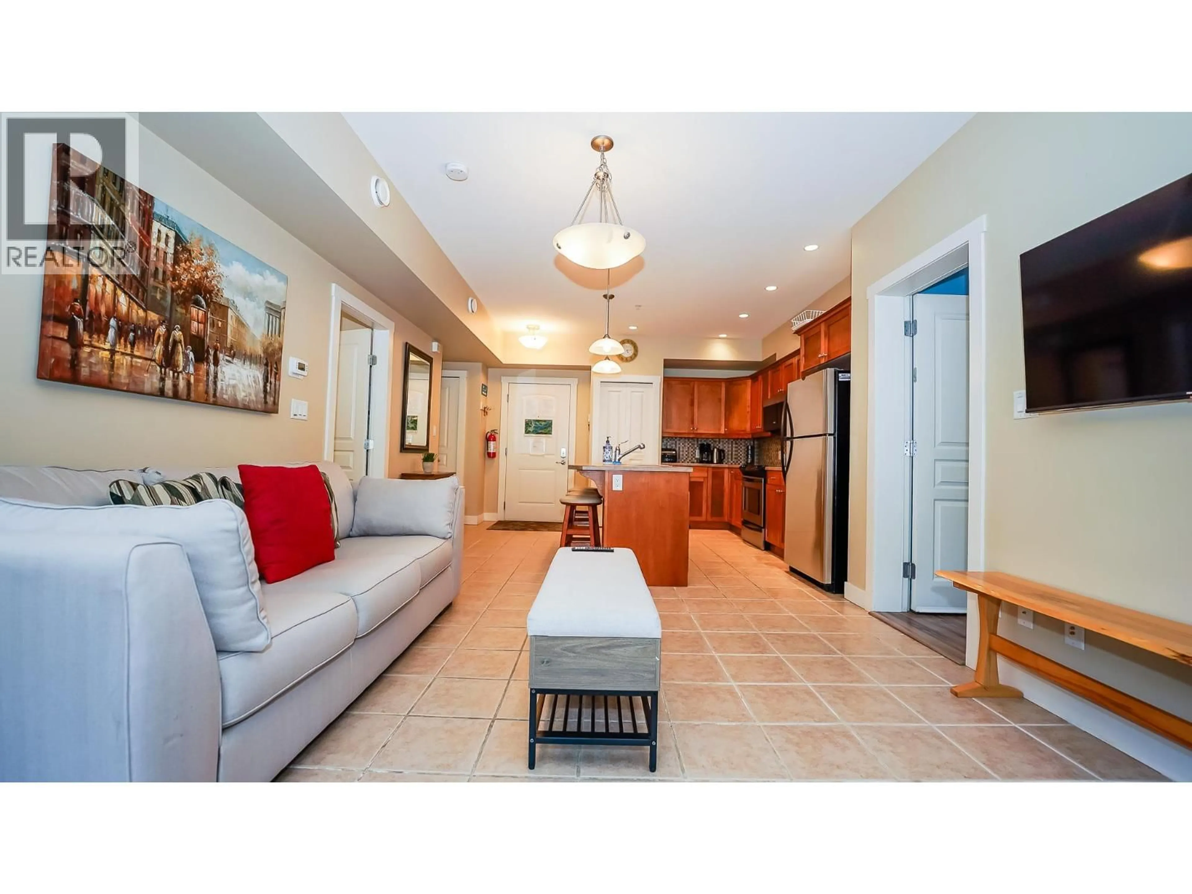 Open concept kitchen, ceramic/tile floor for 100 & 108 - 302 MARA LAKE LANE, Sicamous British Columbia V0E2V1