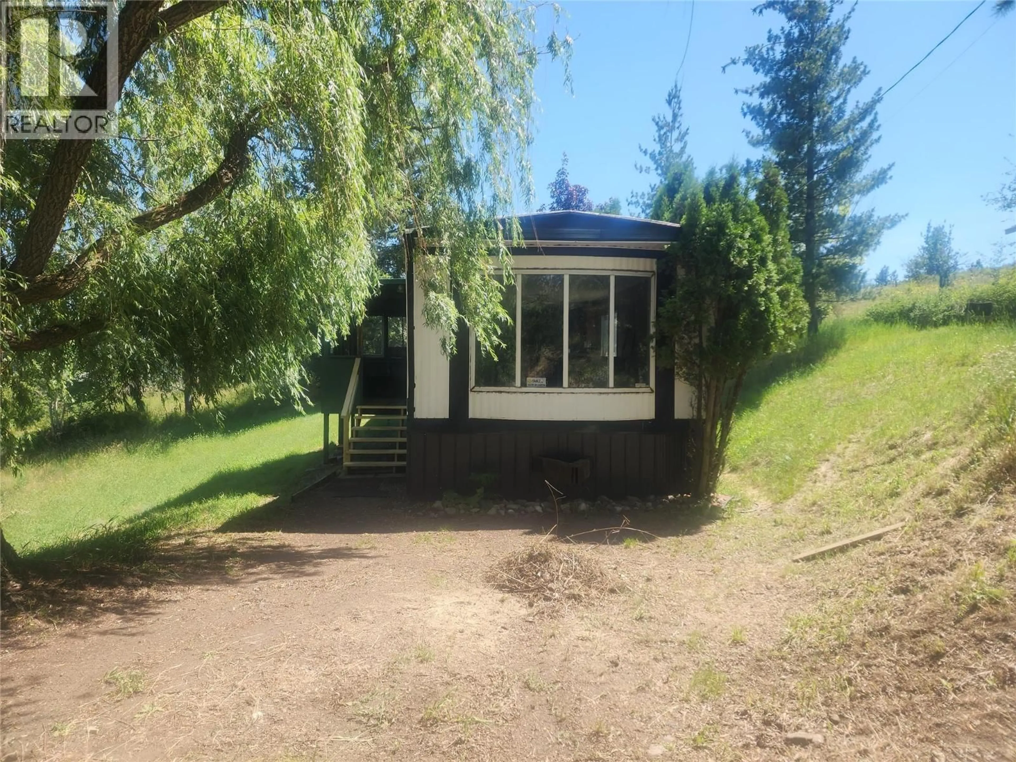 A pic from outside/outdoor area/front of a property/back of a property/a pic from drone, unknown for 6105 SLEEPY HOLLOW ROAD, Grand Forks British Columbia V0H1H5