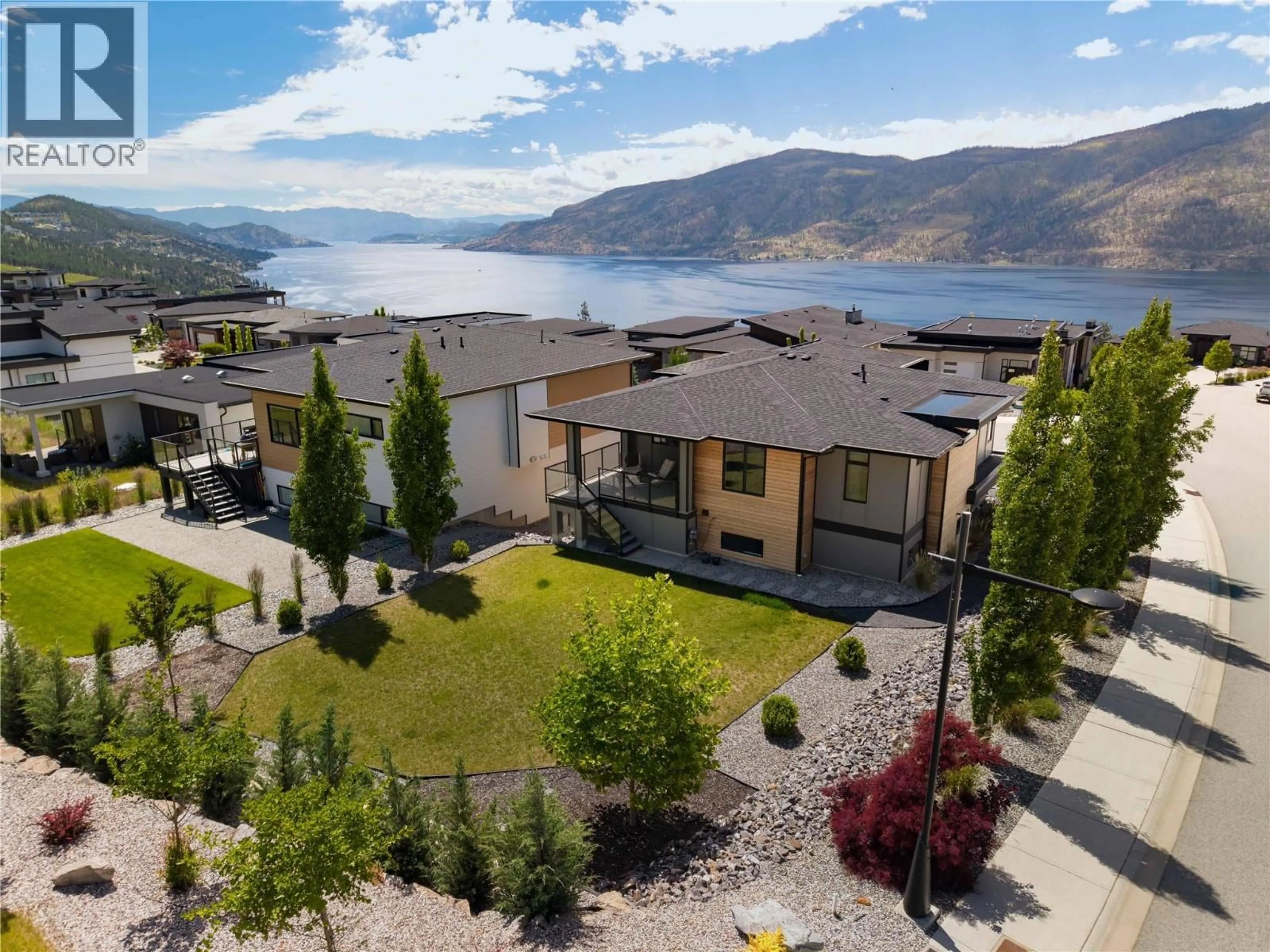 A pic from outside/outdoor area/front of a property/back of a property/a pic from drone, water/lake/river/ocean view for 9499 LEDGESTONE ROAD, Lake Country British Columbia V4V0A4