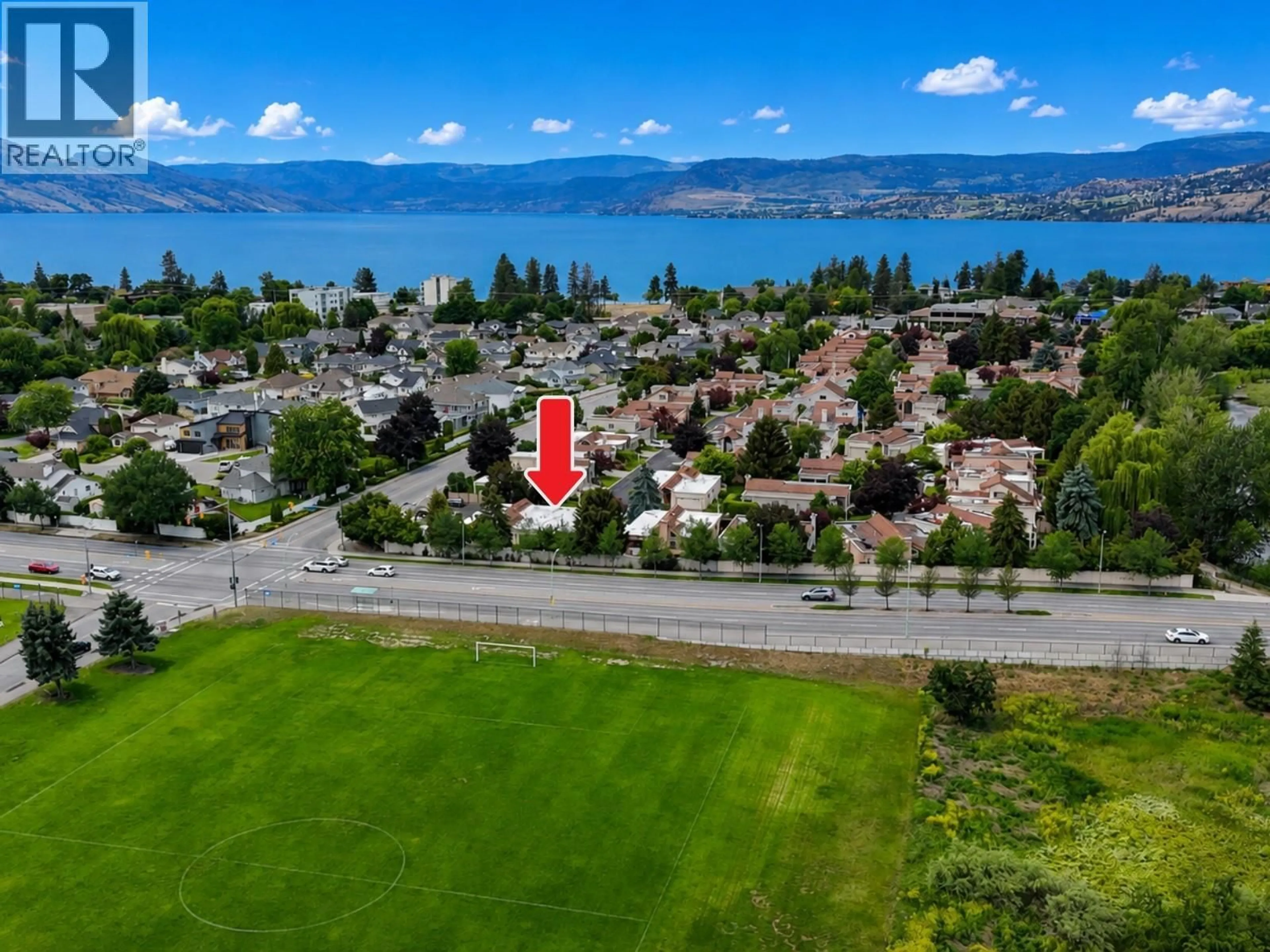 A pic from outside/outdoor area/front of a property/back of a property/a pic from drone, water/lake/river/ocean view for 212 - 650 LEXINGTON DRIVE, Kelowna British Columbia V1W3B6