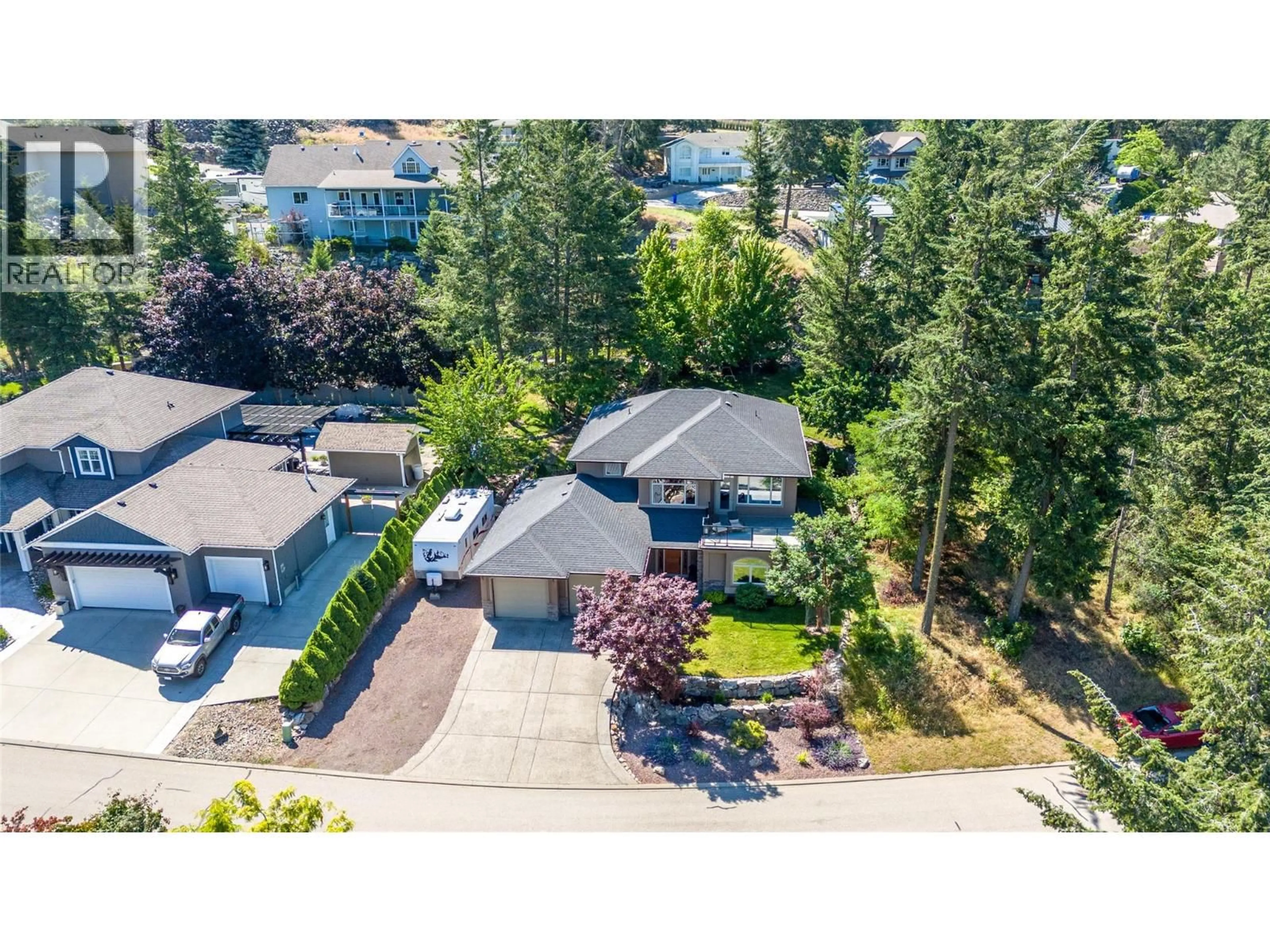 A pic from outside/outdoor area/front of a property/back of a property/a pic from drone, street for 30 - 40 KESTREL PLACE, Vernon British Columbia V1H1S6