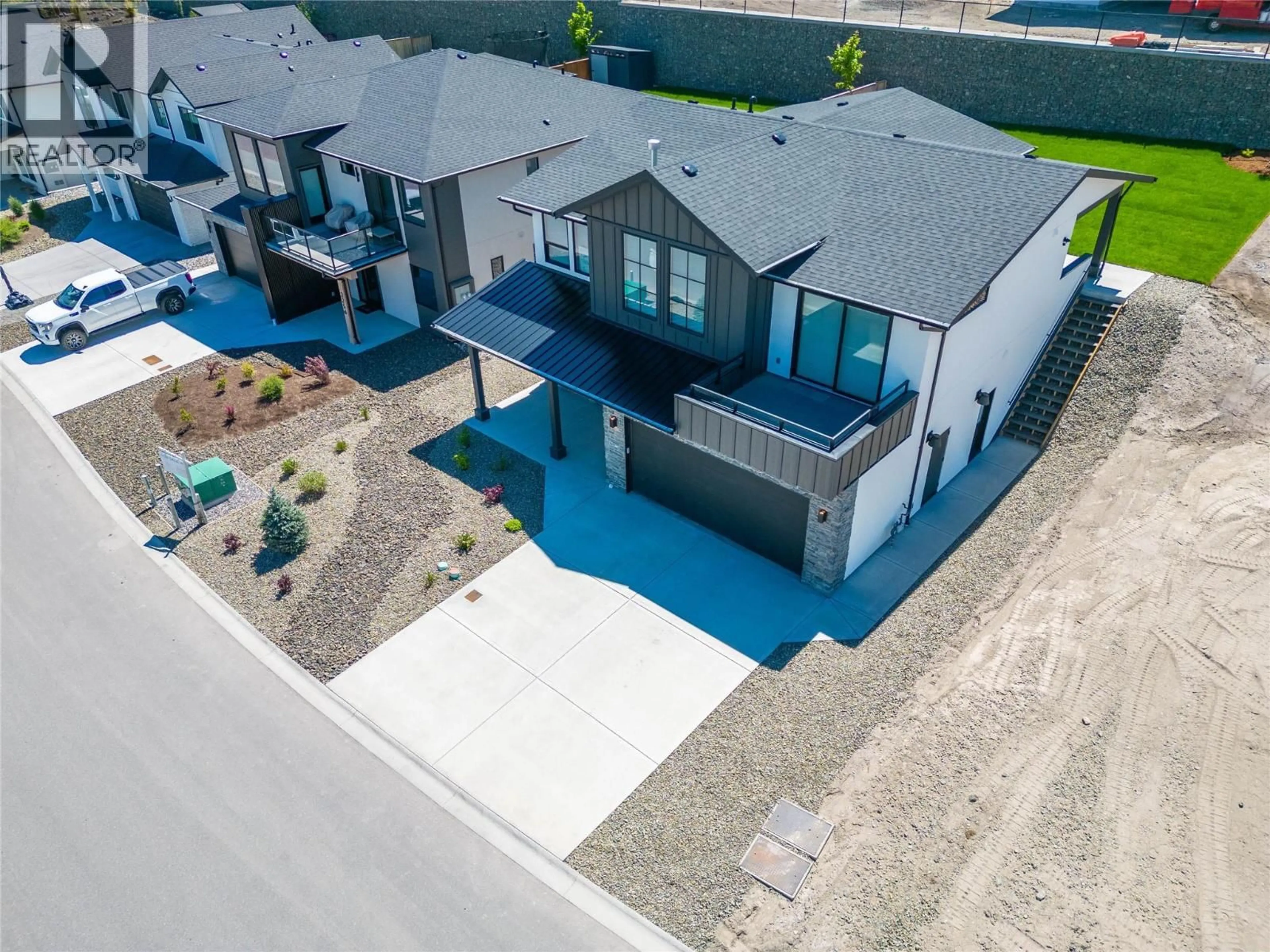 A pic from outside/outdoor area/front of a property/back of a property/a pic from drone, street for 2264 COLDWATER DRIVE, Kamloops British Columbia V2E0E6