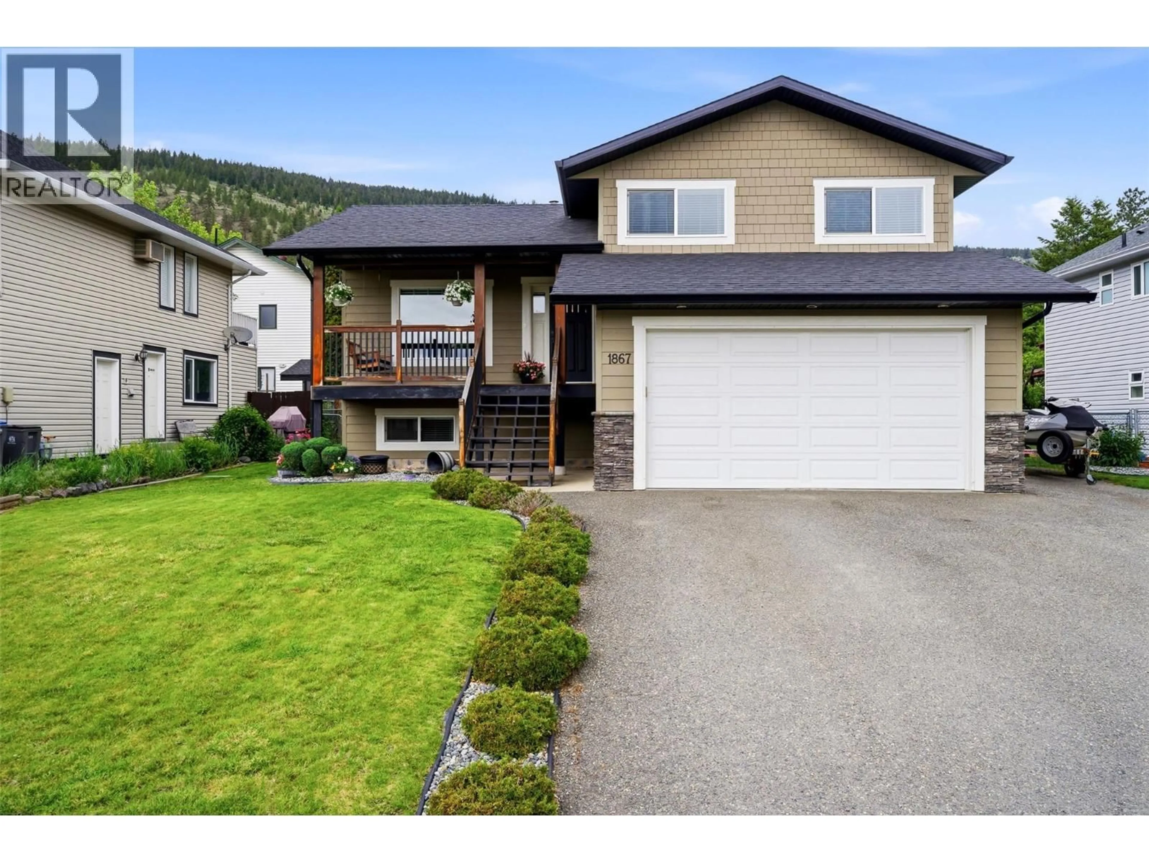 Home with vinyl exterior material, street for 1867 JUNIPER DRIVE, Merritt British Columbia V1K1J4