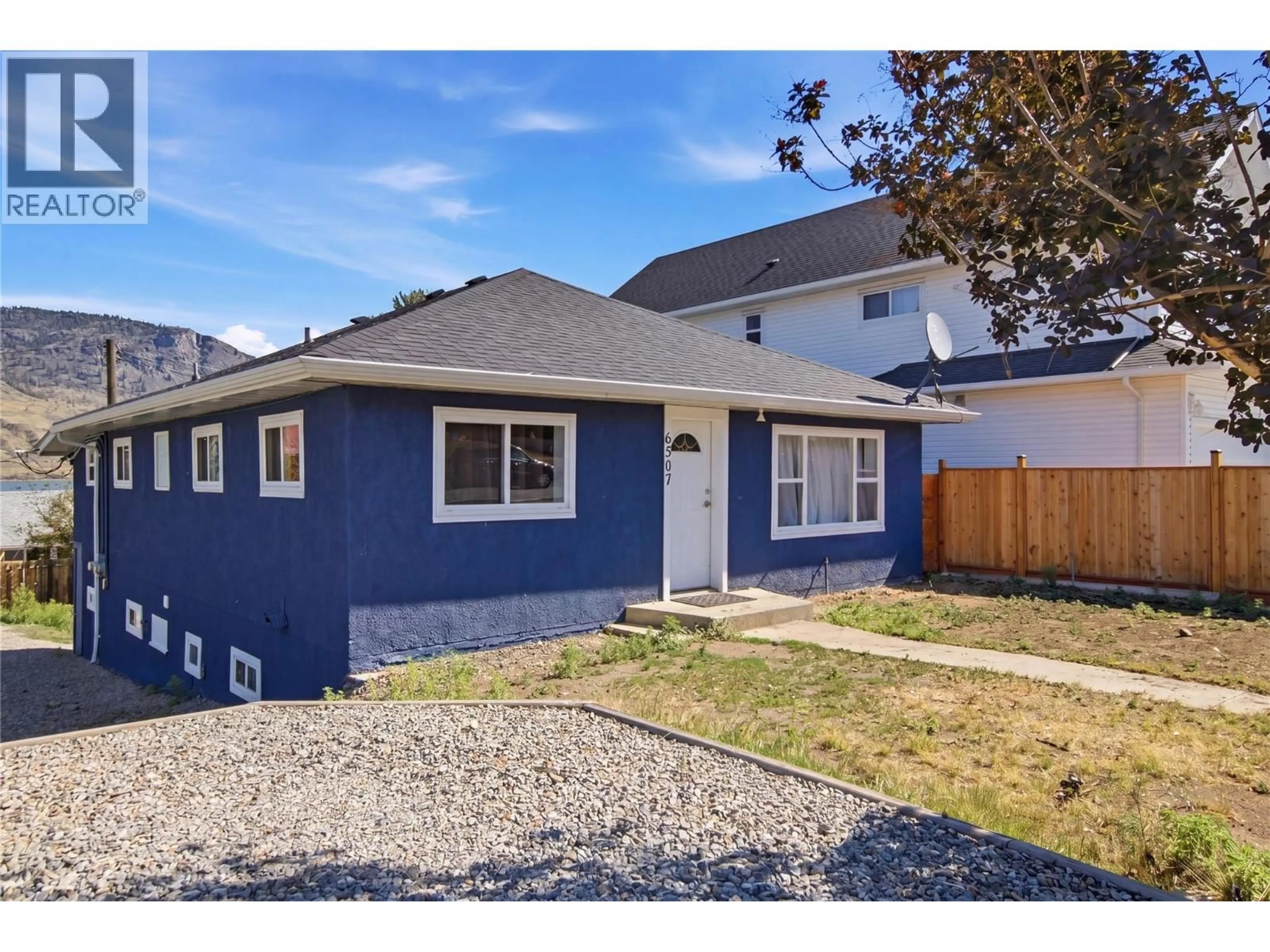 Home with vinyl exterior material, street for 6507 SAVONA ACCESS ROAD, Kamloops British Columbia V0K2J0