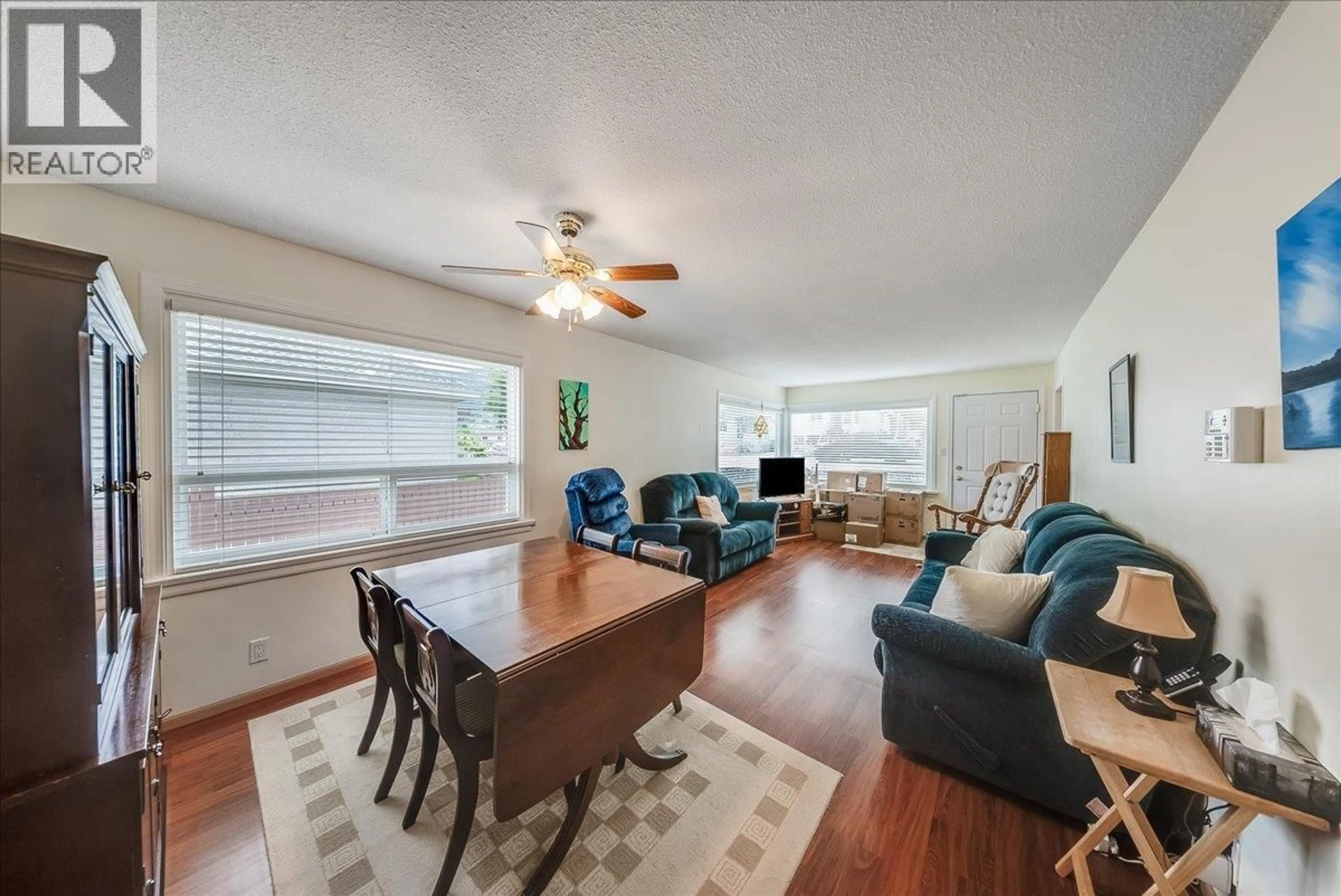 Living room with furniture, wood/laminate floor for 1817 FOURTH AVENUE, Trail British Columbia V1R1T2