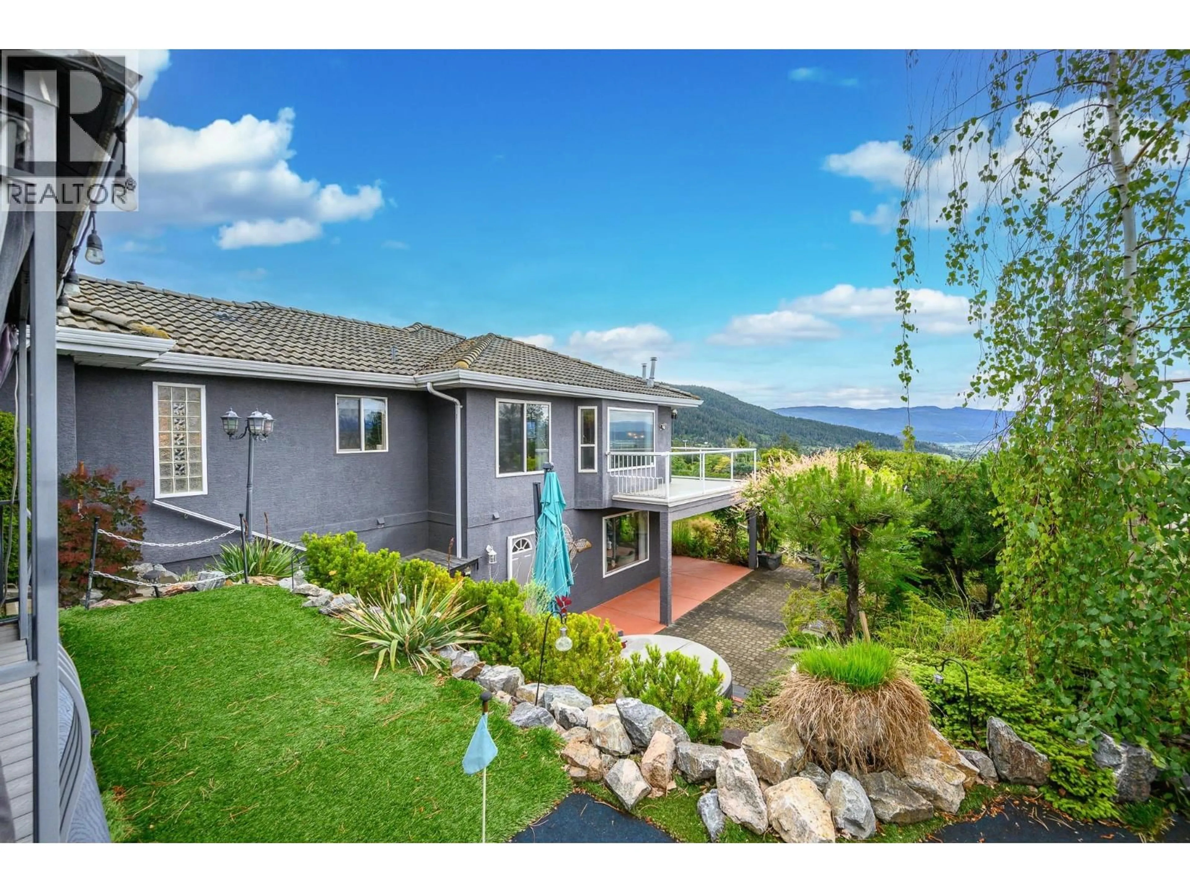 A pic from outside/outdoor area/front of a property/back of a property/a pic from drone, water/lake/river/ocean view for 3 - 6901 MANNING PLACE, Vernon British Columbia V1B2Y6