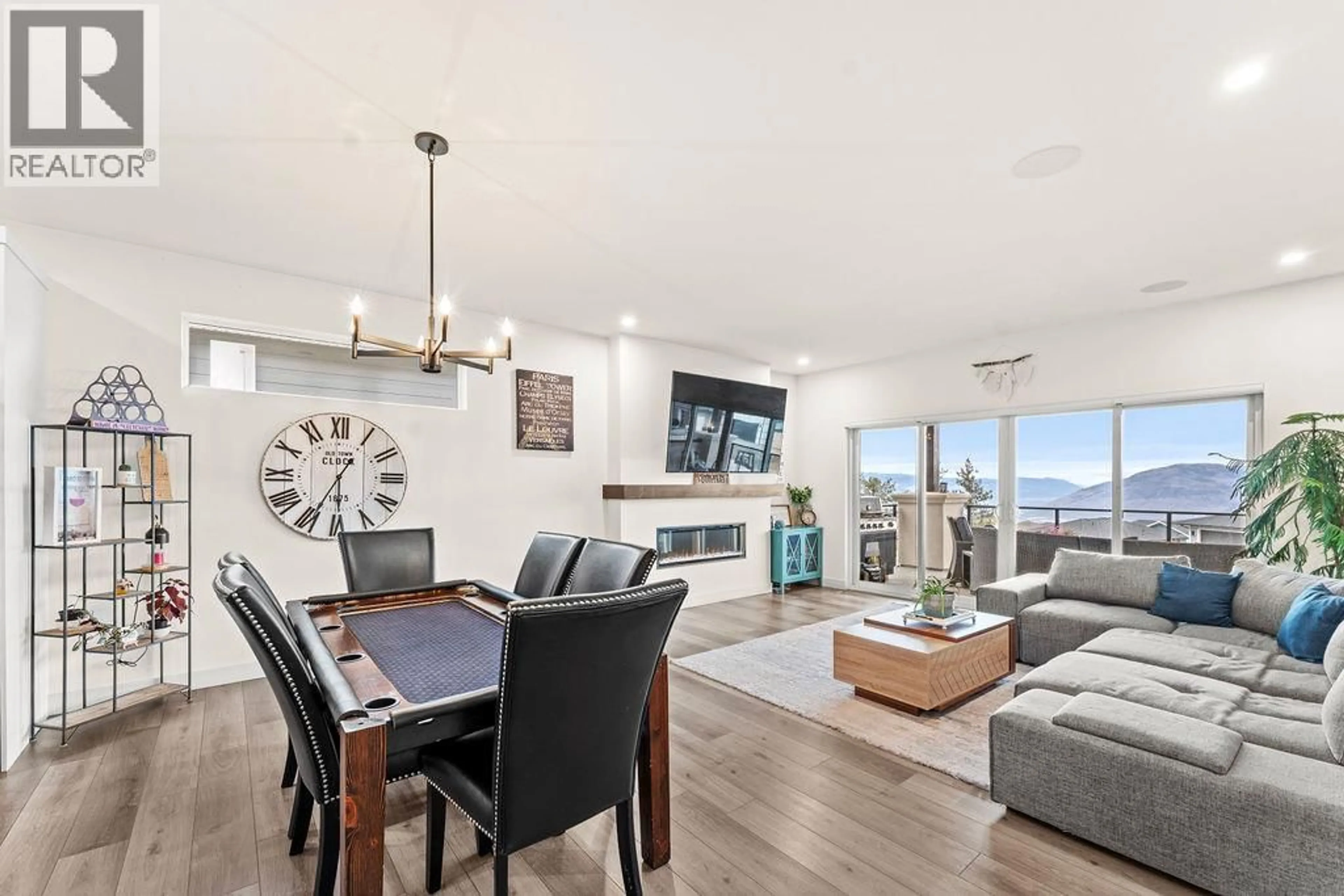 Living room with furniture, wood/laminate floor for 544 EDINBURGH COURT, Kamloops British Columbia V1S0E6
