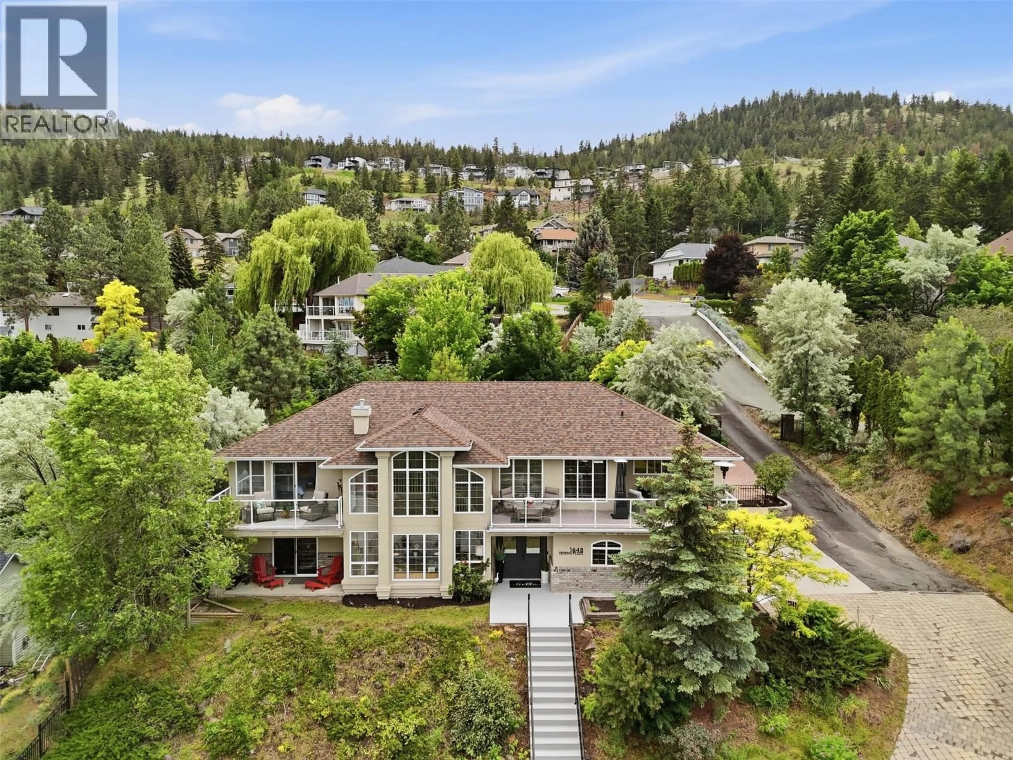 A pic from outside/outdoor area/front of a property/back of a property/a pic from drone, mountain view for 1648 SKEENA PLACE, Kamloops British Columbia V2E2P3