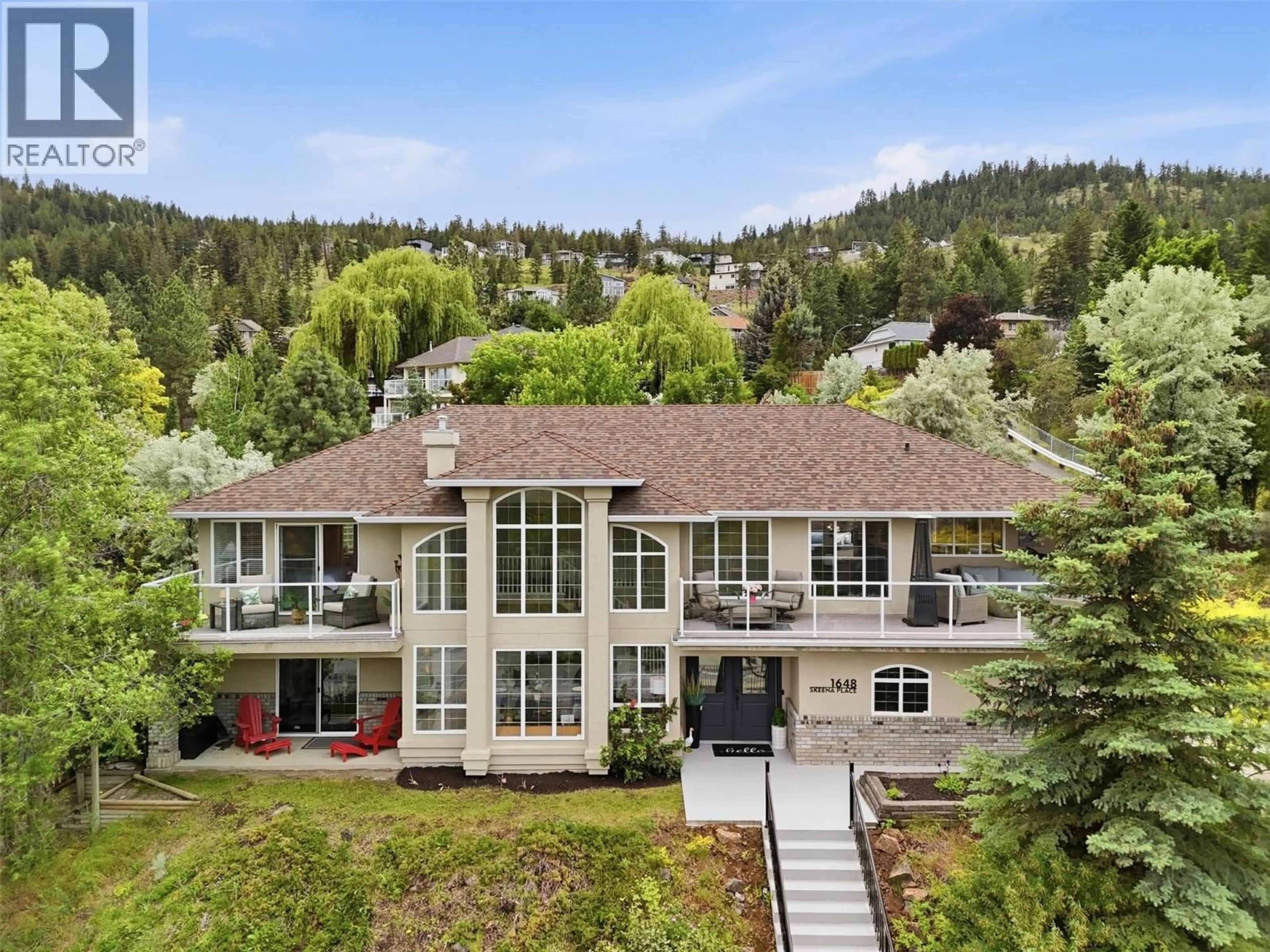 A pic from outside/outdoor area/front of a property/back of a property/a pic from drone, mountain view for 1648 SKEENA PLACE, Kamloops British Columbia V2E2P3