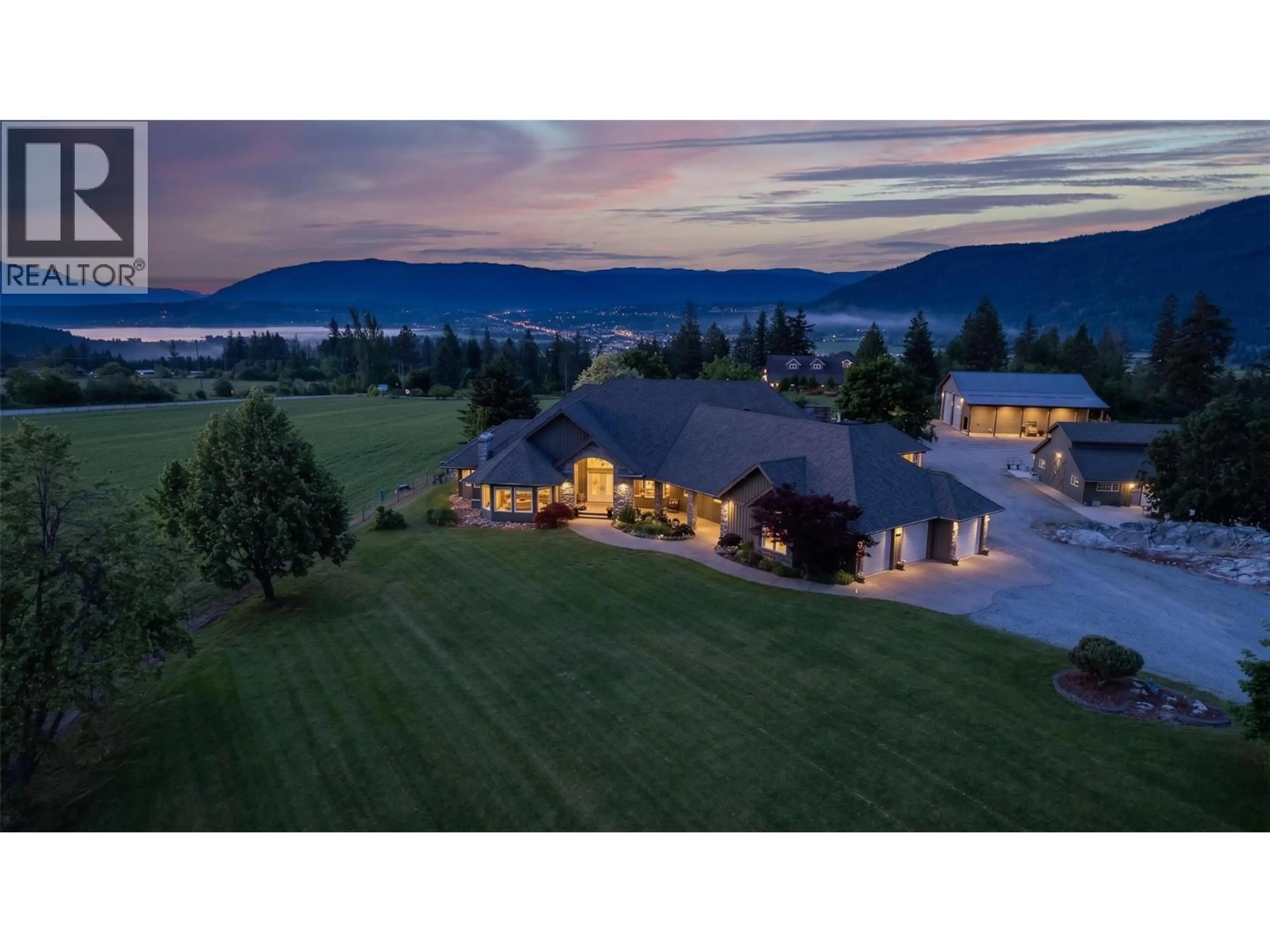A pic from outside/outdoor area/front of a property/back of a property/a pic from drone, mountain view for 1 - 6500 15TH AVENUE SOUTHWEST, Salmon Arm British Columbia V1E1R5