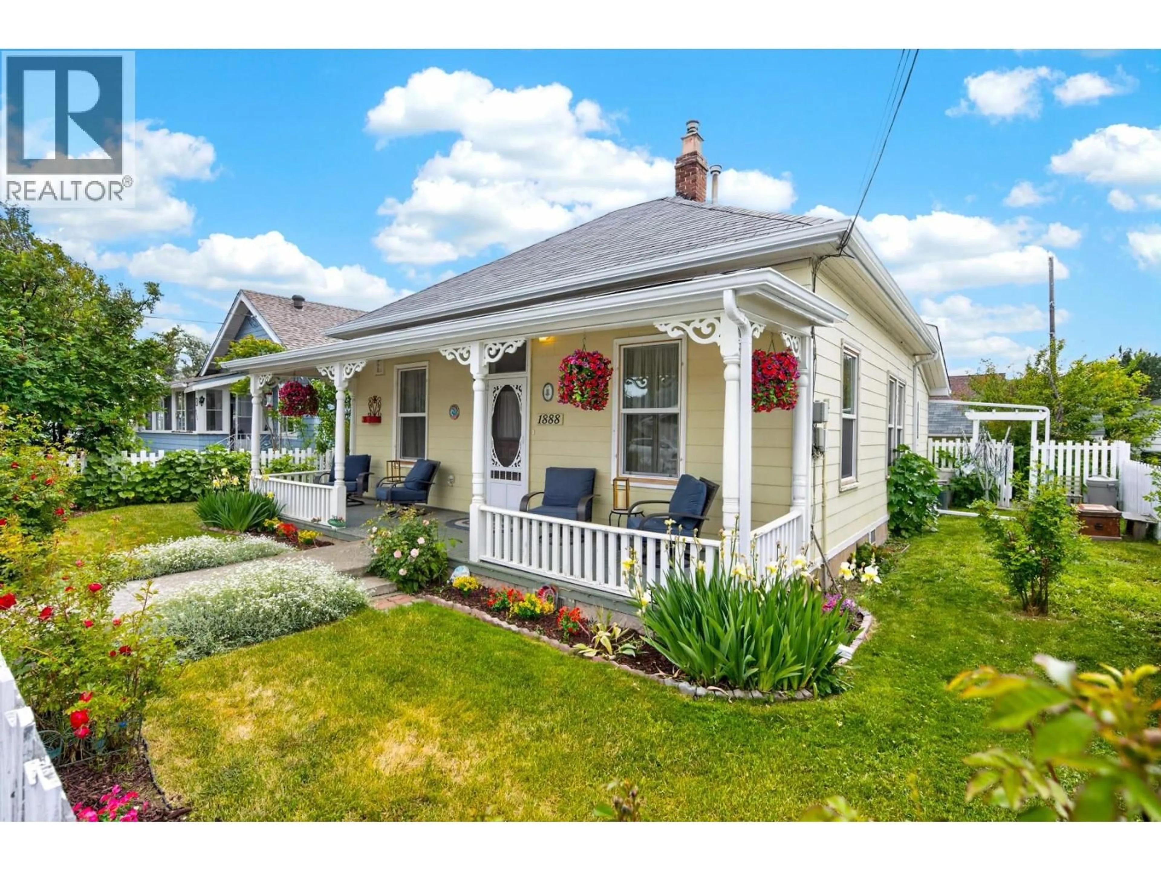Home with vinyl exterior material, street for 1888 GRANITE AVENUE, Merritt British Columbia V1K1B8