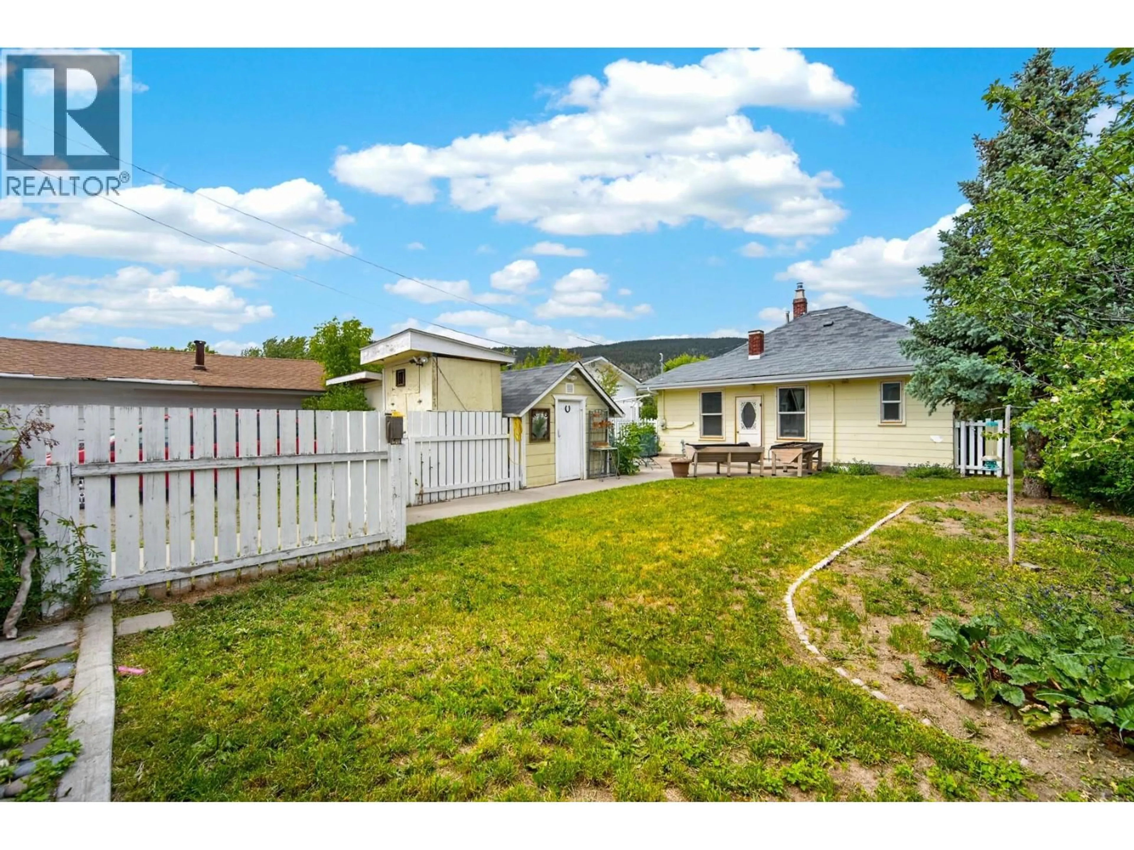 A pic from outside/outdoor area/front of a property/back of a property/a pic from drone, street for 1888 GRANITE AVENUE, Merritt British Columbia V1K1B8