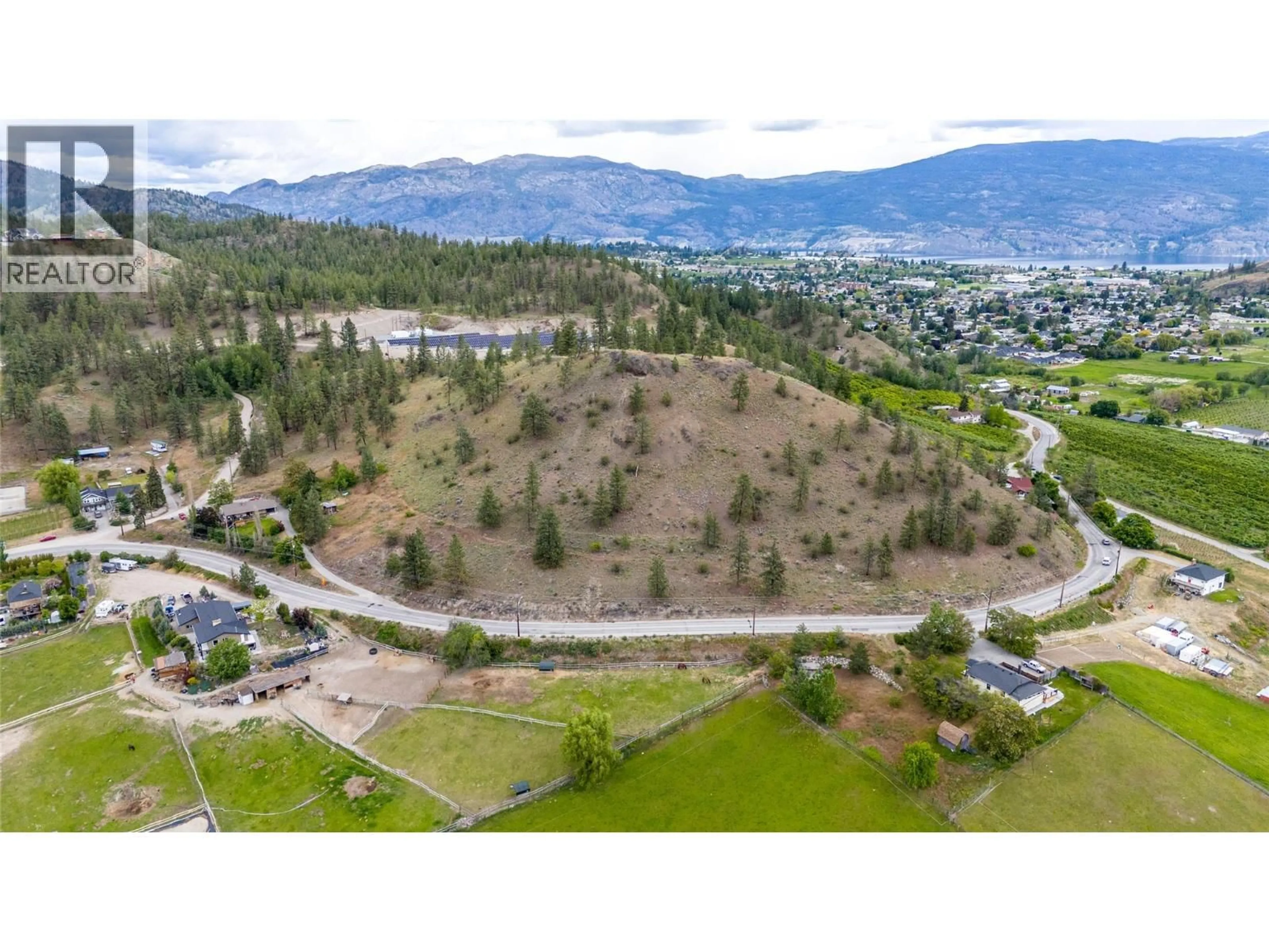 A pic from outside/outdoor area/front of a property/back of a property/a pic from drone, mountain view for 13316 PRAIRIE VALLEY ROAD, Summerland British Columbia V0H1Z8