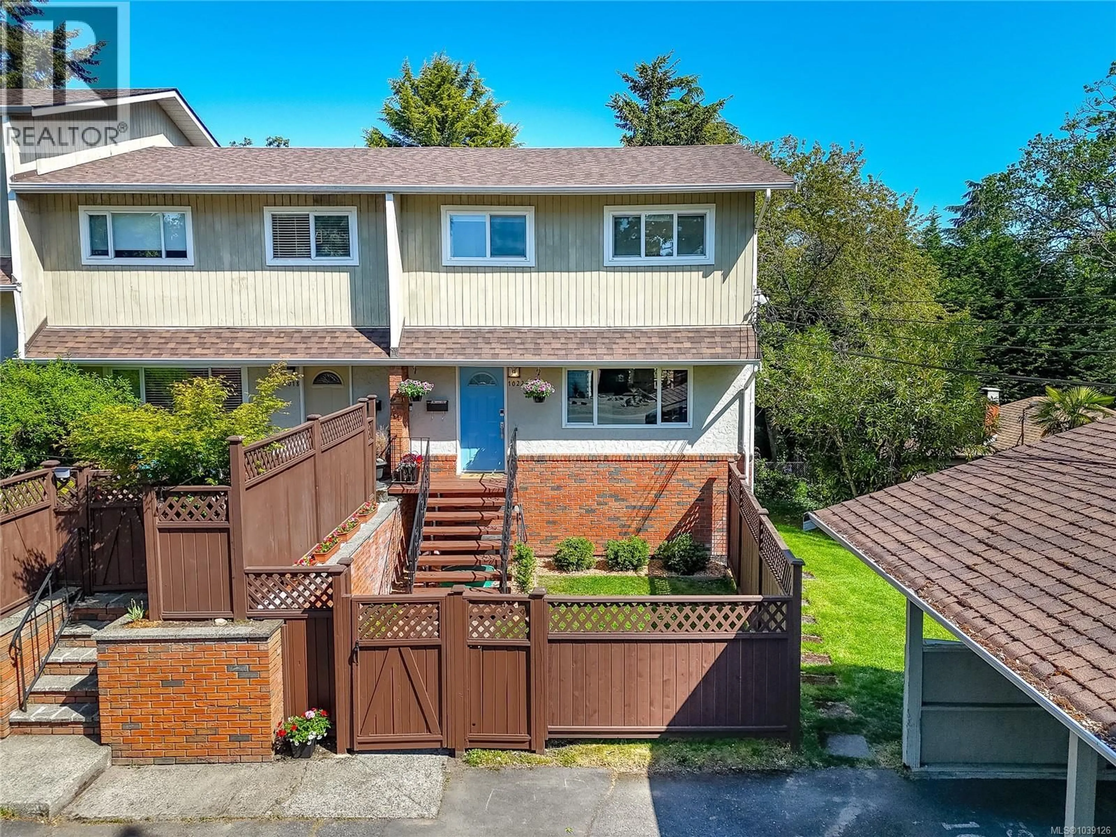 A pic from outside/outdoor area/front of a property/back of a property/a pic from drone, street for 1022 FALMOUTH ROAD, Saanich British Columbia V8X3A5