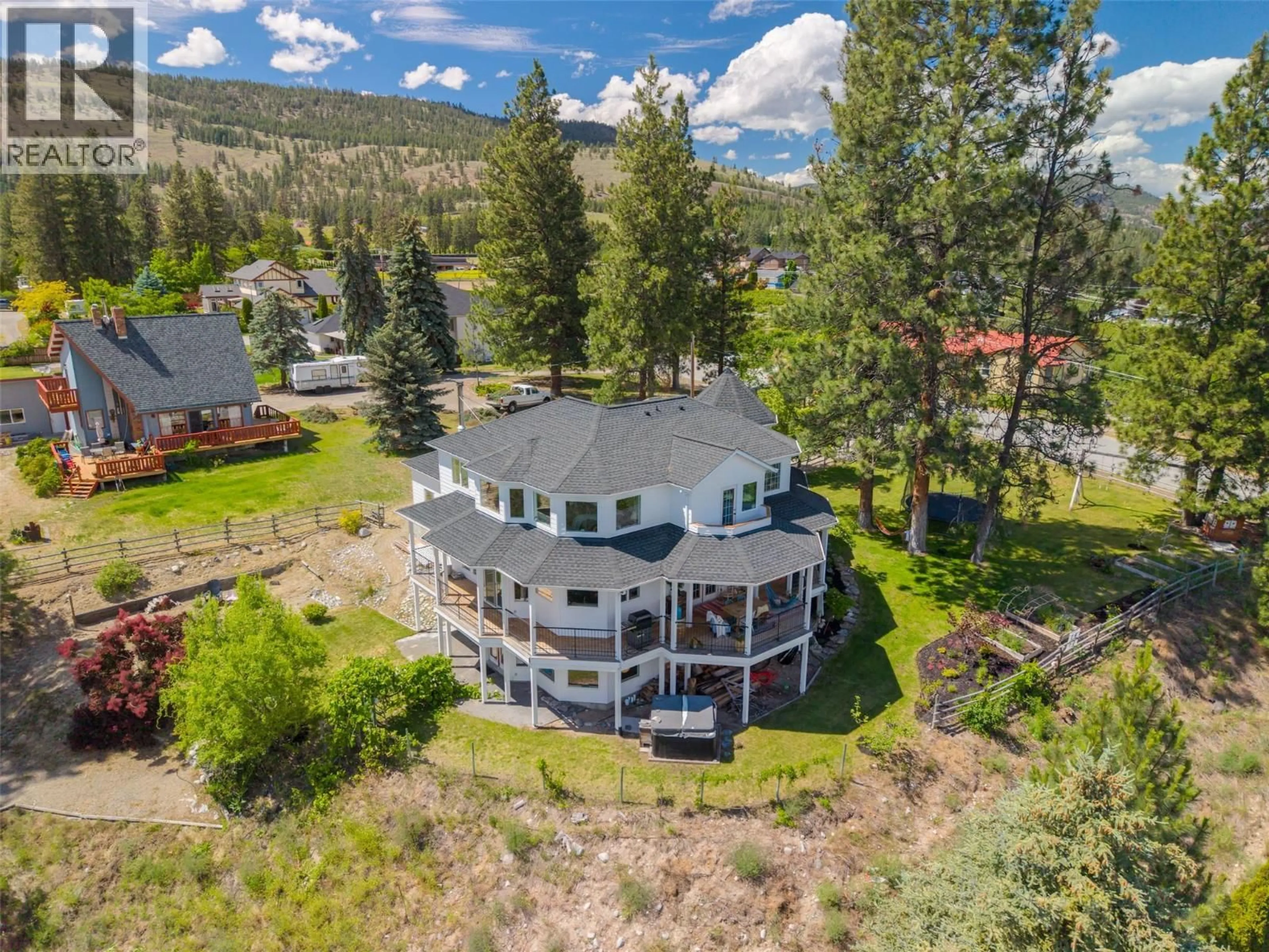 A pic from outside/outdoor area/front of a property/back of a property/a pic from drone, water/lake/river/ocean view for 9331 CANYON VIEW ROAD, Summerland British Columbia V0H1Z2