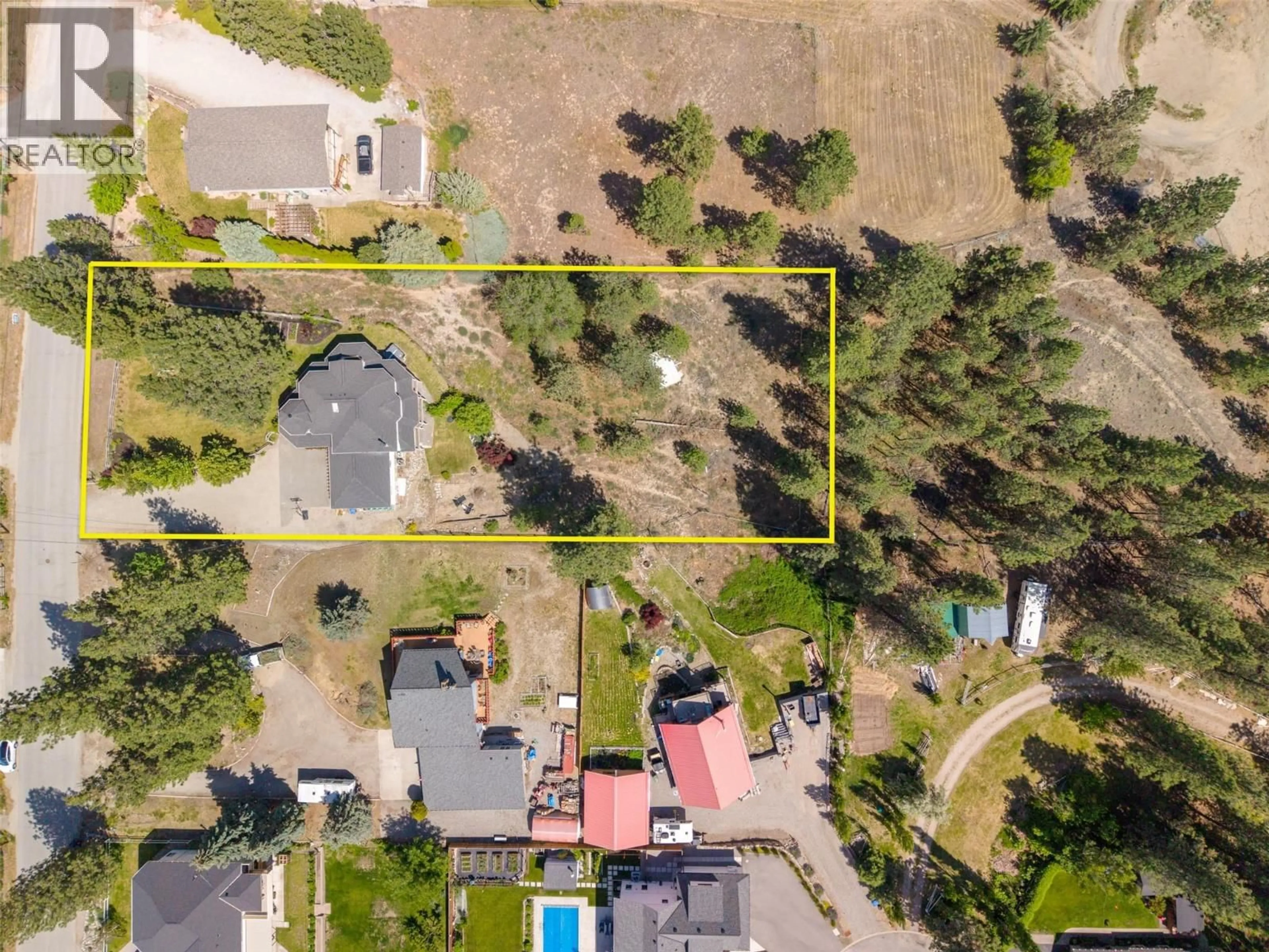 A pic from outside/outdoor area/front of a property/back of a property/a pic from drone, street for 9331 CANYON VIEW ROAD, Summerland British Columbia V0H1Z2