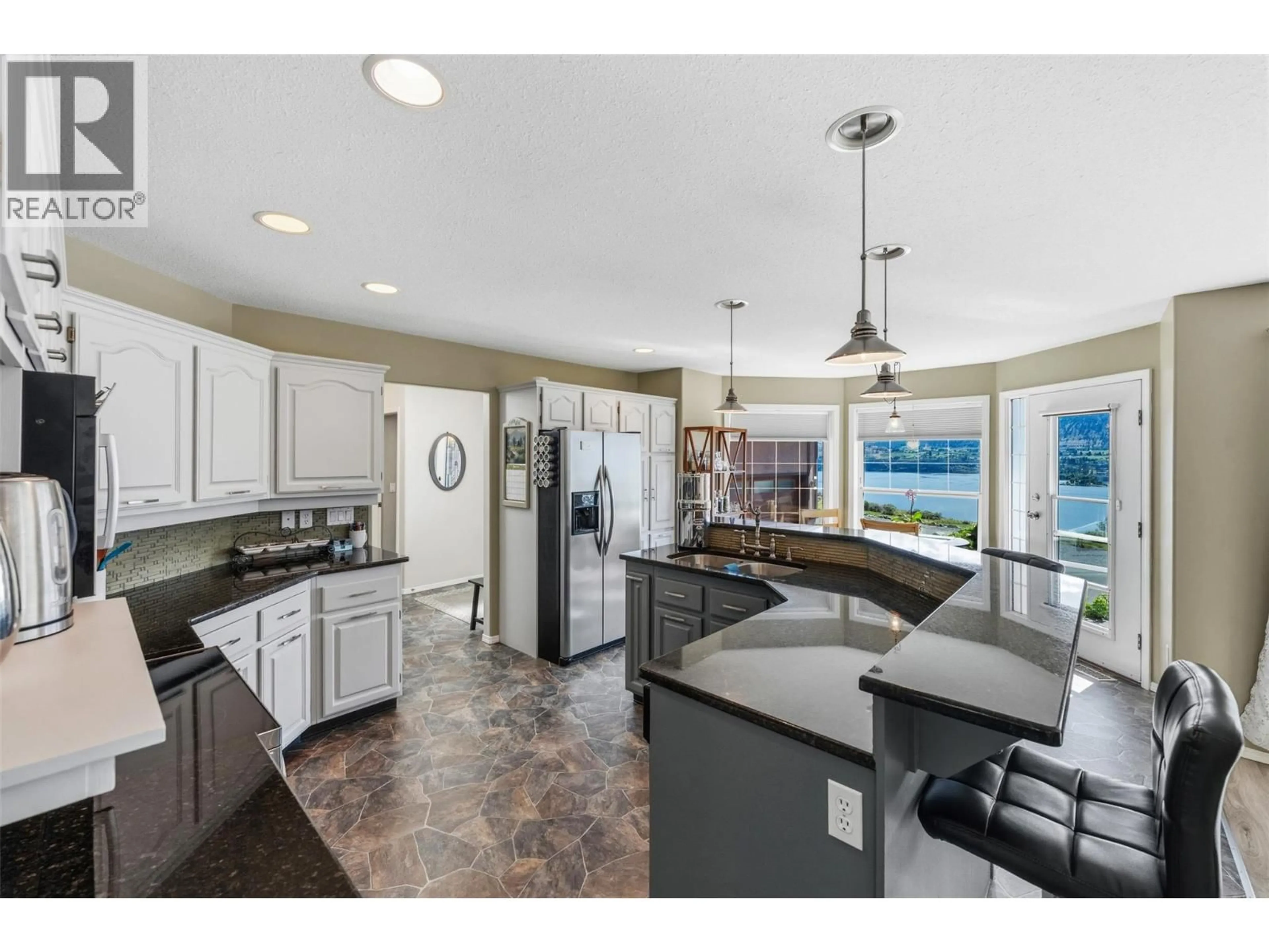 Open concept kitchen, ceramic/tile floor for 422 RIDGE ROAD, Penticton British Columbia V2A8N7
