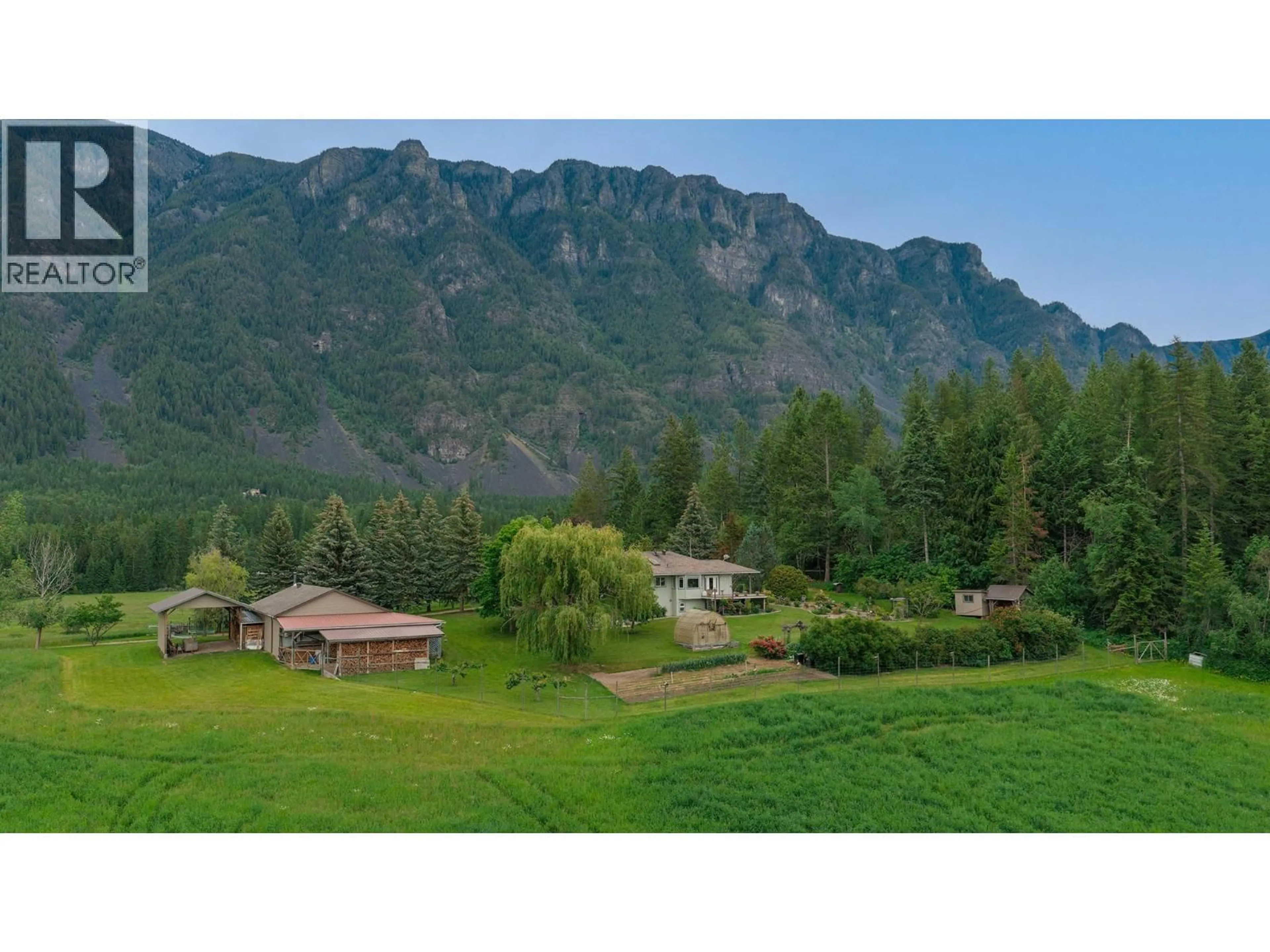 A pic from outside/outdoor area/front of a property/back of a property/a pic from drone, mountain view for 3319 LLOYD ROAD, Canyon British Columbia V0B1C1