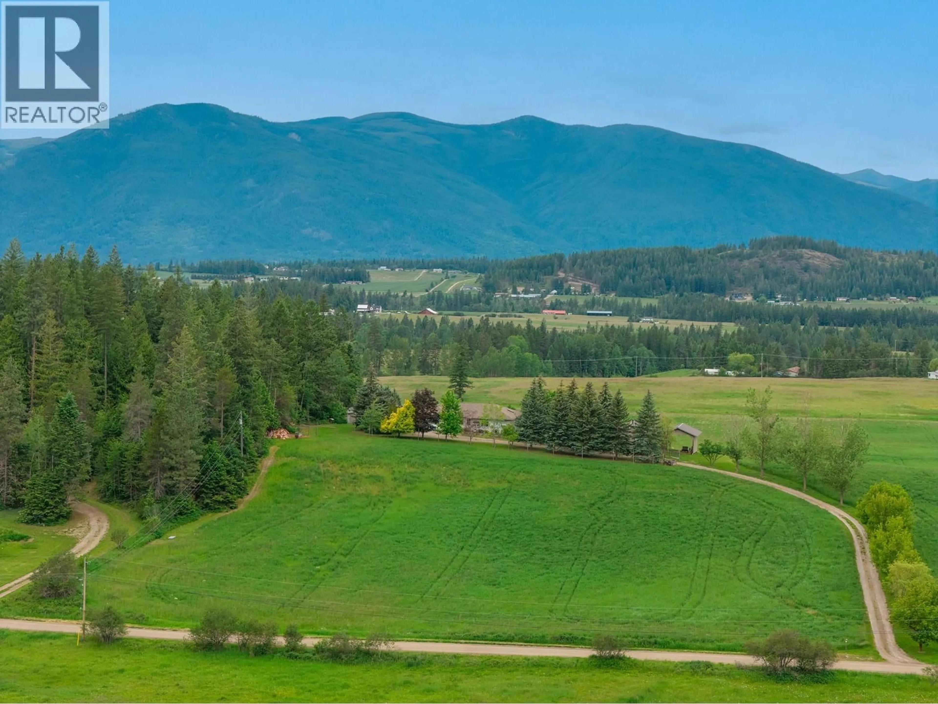 A pic from outside/outdoor area/front of a property/back of a property/a pic from drone, mountain view for 3319 LLOYD ROAD, Canyon British Columbia V0B1C1
