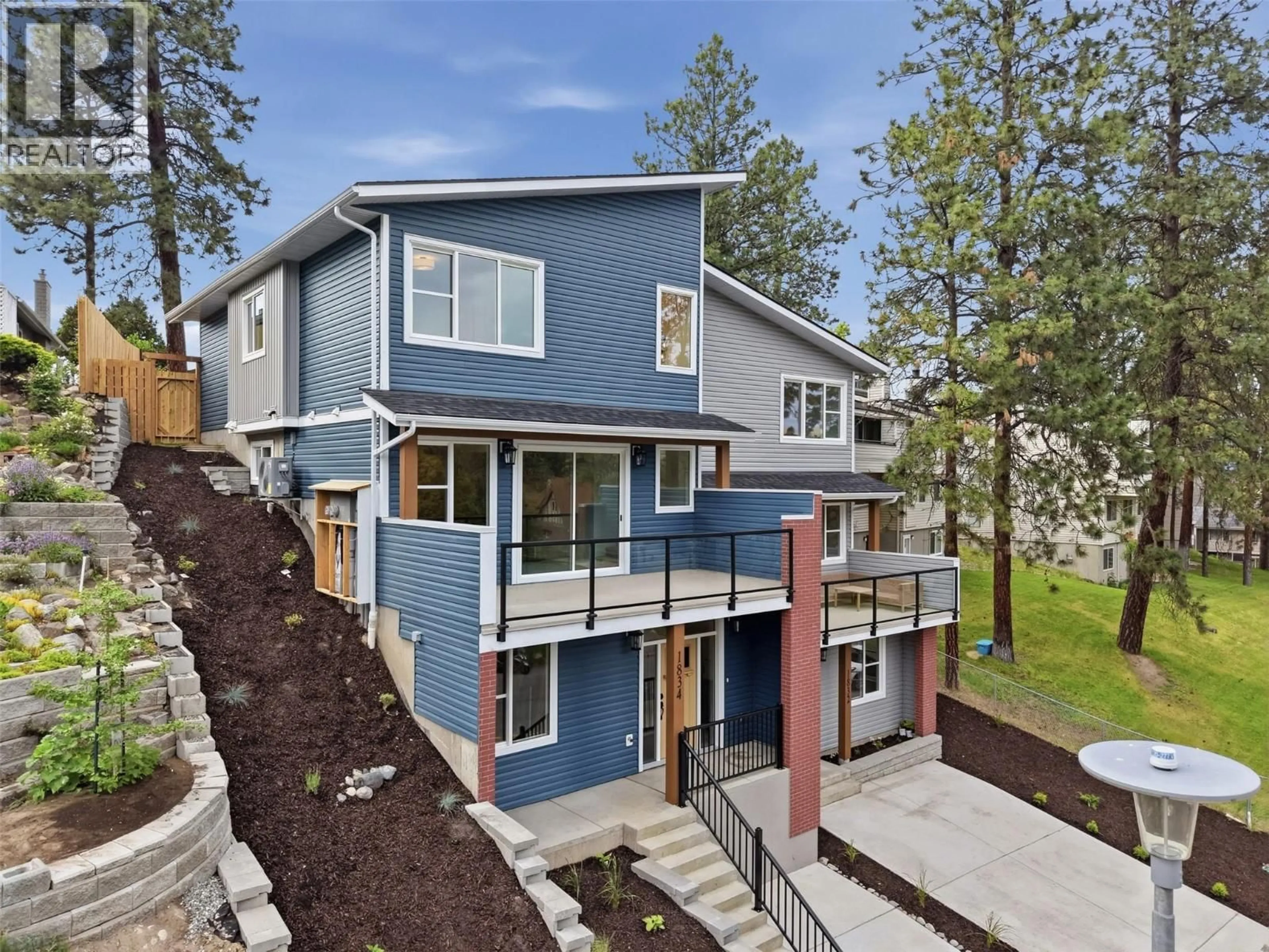 Home with vinyl exterior material, street for 1834 SPRINGHILL DRIVE, Kamloops British Columbia V2E1P9