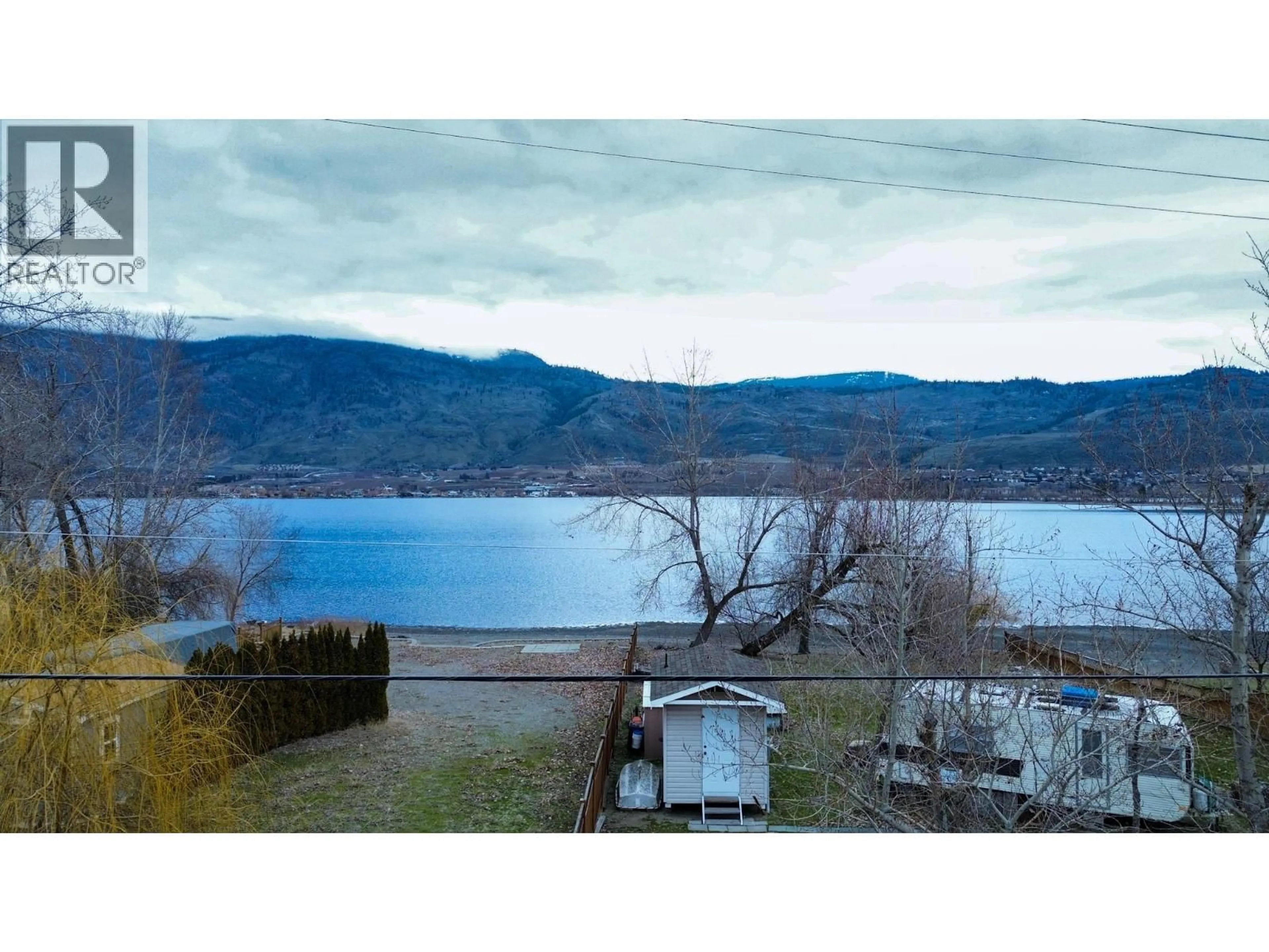 A pic from outside/outdoor area/front of a property/back of a property/a pic from drone, water/lake/river/ocean view for 4026 OLEANDER DRIVE, Osoyoos British Columbia V0H1V1