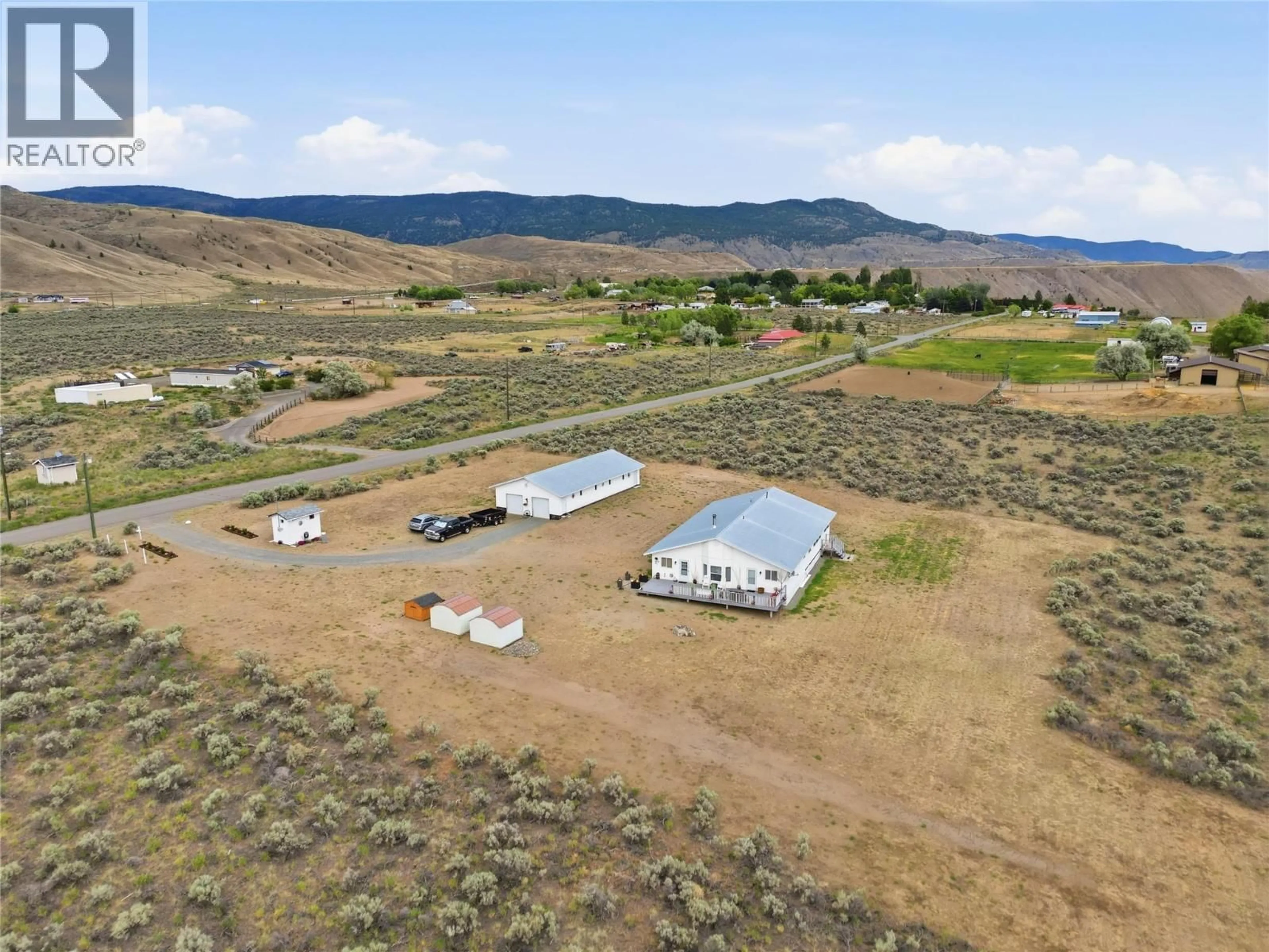 A pic from outside/outdoor area/front of a property/back of a property/a pic from drone, mountain view for 6584 PINECREST DRIVE, Cache Creek British Columbia V0K2P0