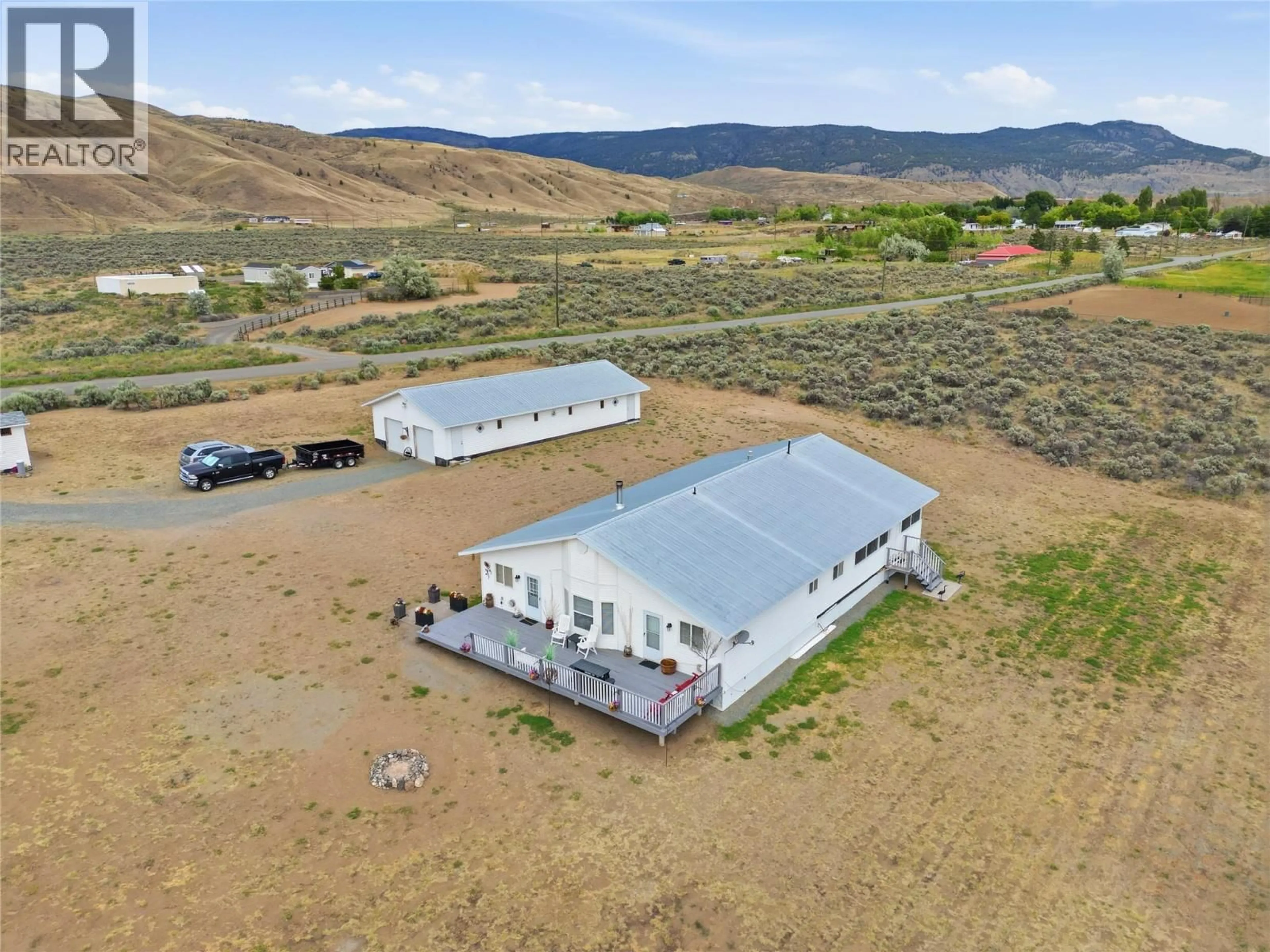 A pic from outside/outdoor area/front of a property/back of a property/a pic from drone, building for 6584 PINECREST DRIVE, Cache Creek British Columbia V0K2P0