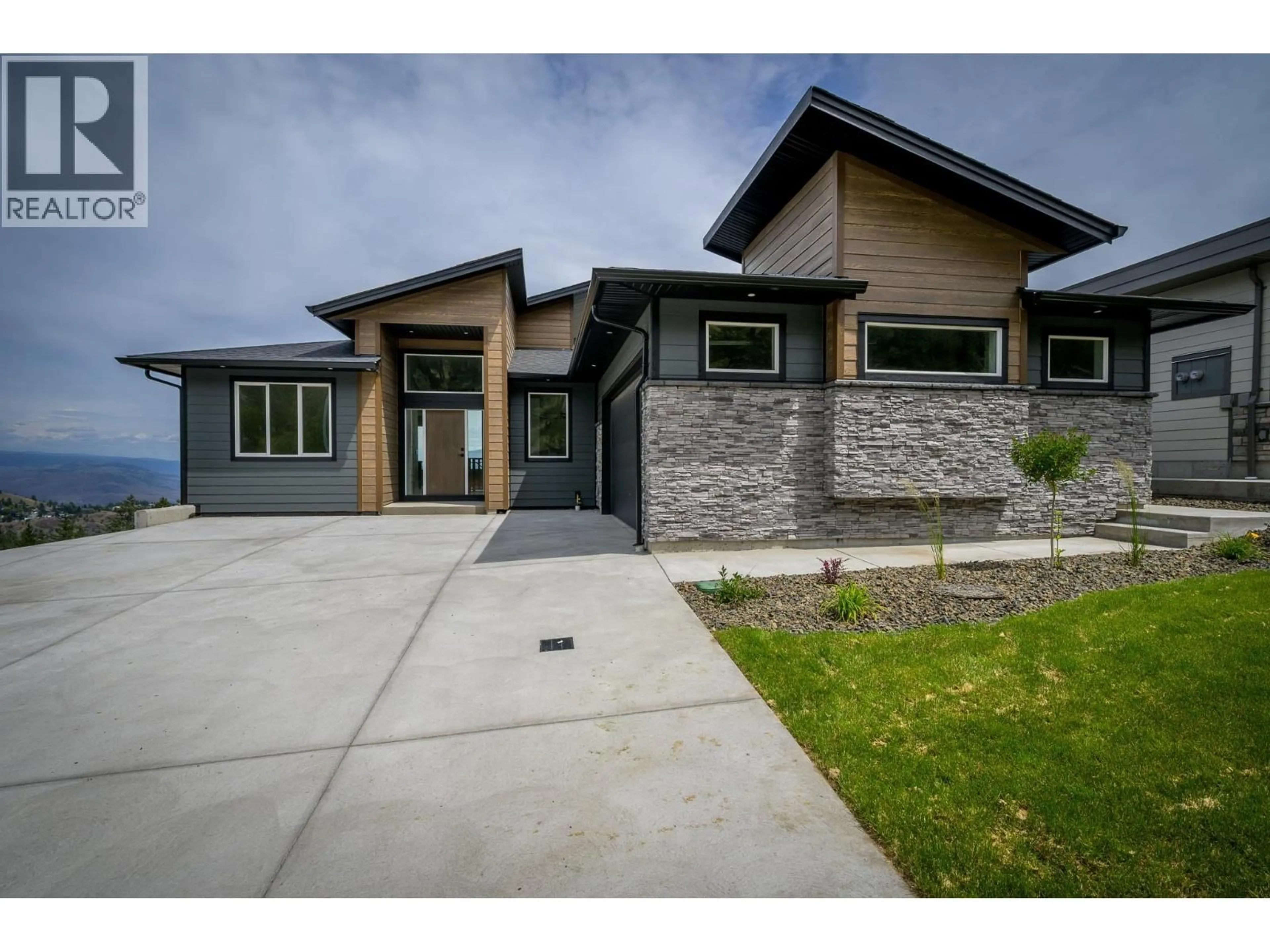 Home with brick exterior material, street for 2138 LINFIELD DRIVE, Kamloops British Columbia V1S0G3