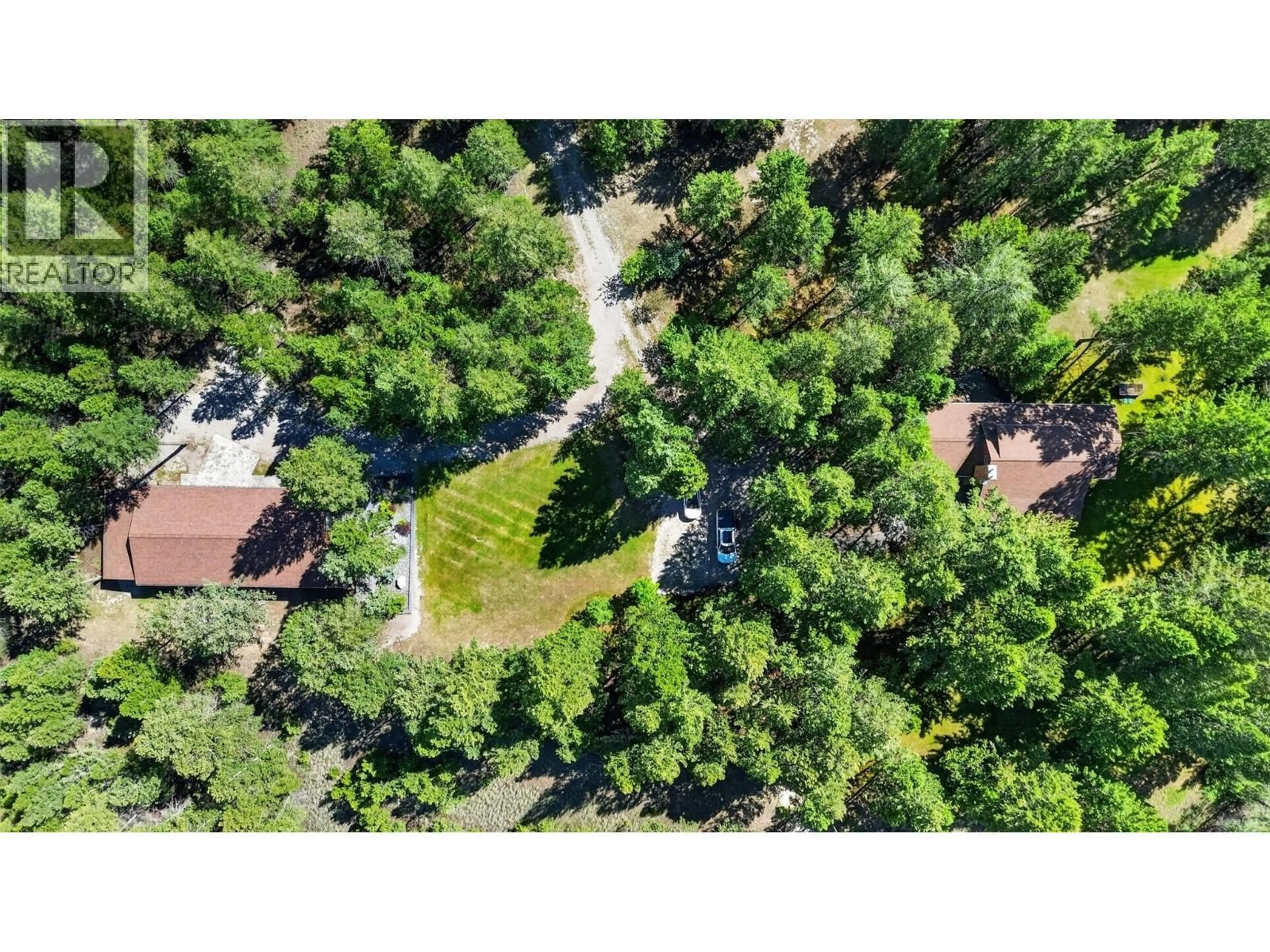 A pic from outside/outdoor area/front of a property/back of a property/a pic from drone, forest/trees view for 8566 EACRETT ROAD, Dry Gulch British Columbia V0A1K2