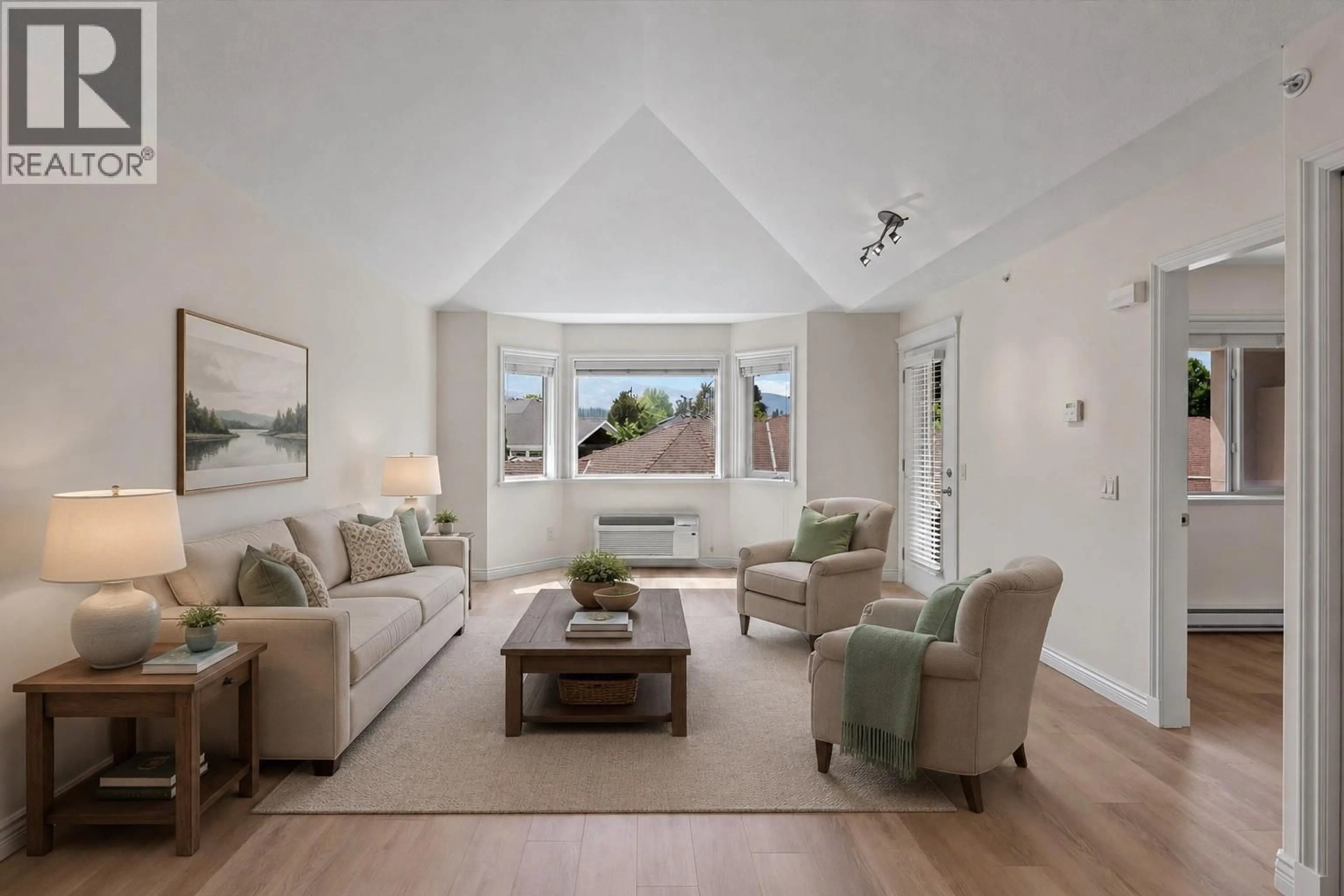 Living room with furniture, unknown for 212 - 4433 GORDON DRIVE, Kelowna British Columbia V1W1S9