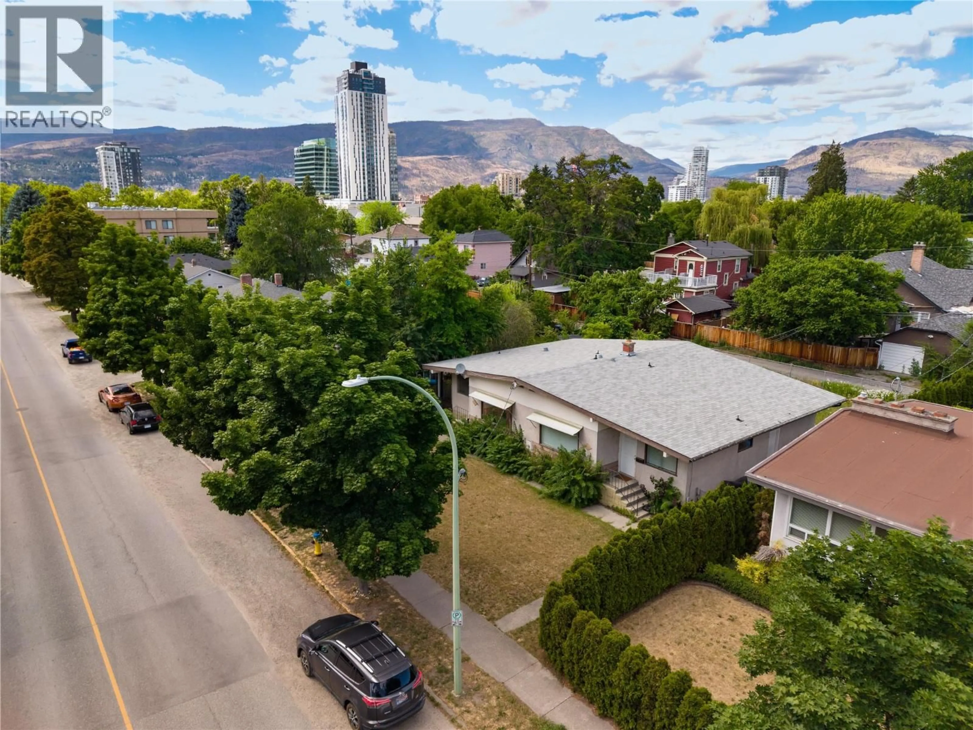 A pic from outside/outdoor area/front of a property/back of a property/a pic from drone, mountain view for 830-832 LEON AVENUE, Kelowna British Columbia V1Y6J8