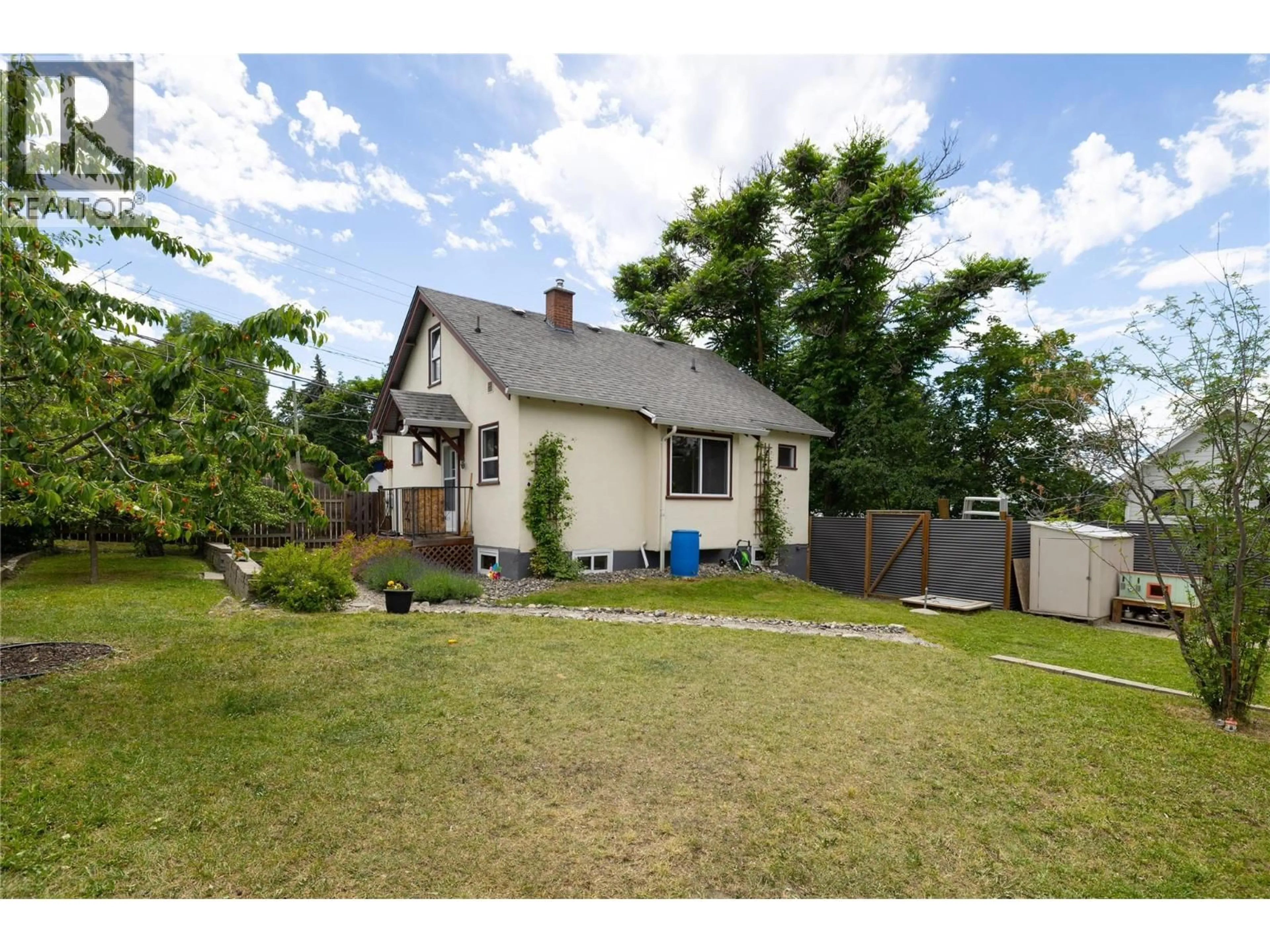 A pic from outside/outdoor area/front of a property/back of a property/a pic from drone, street for 2105 32 AVENUE, Vernon British Columbia V1T2K1