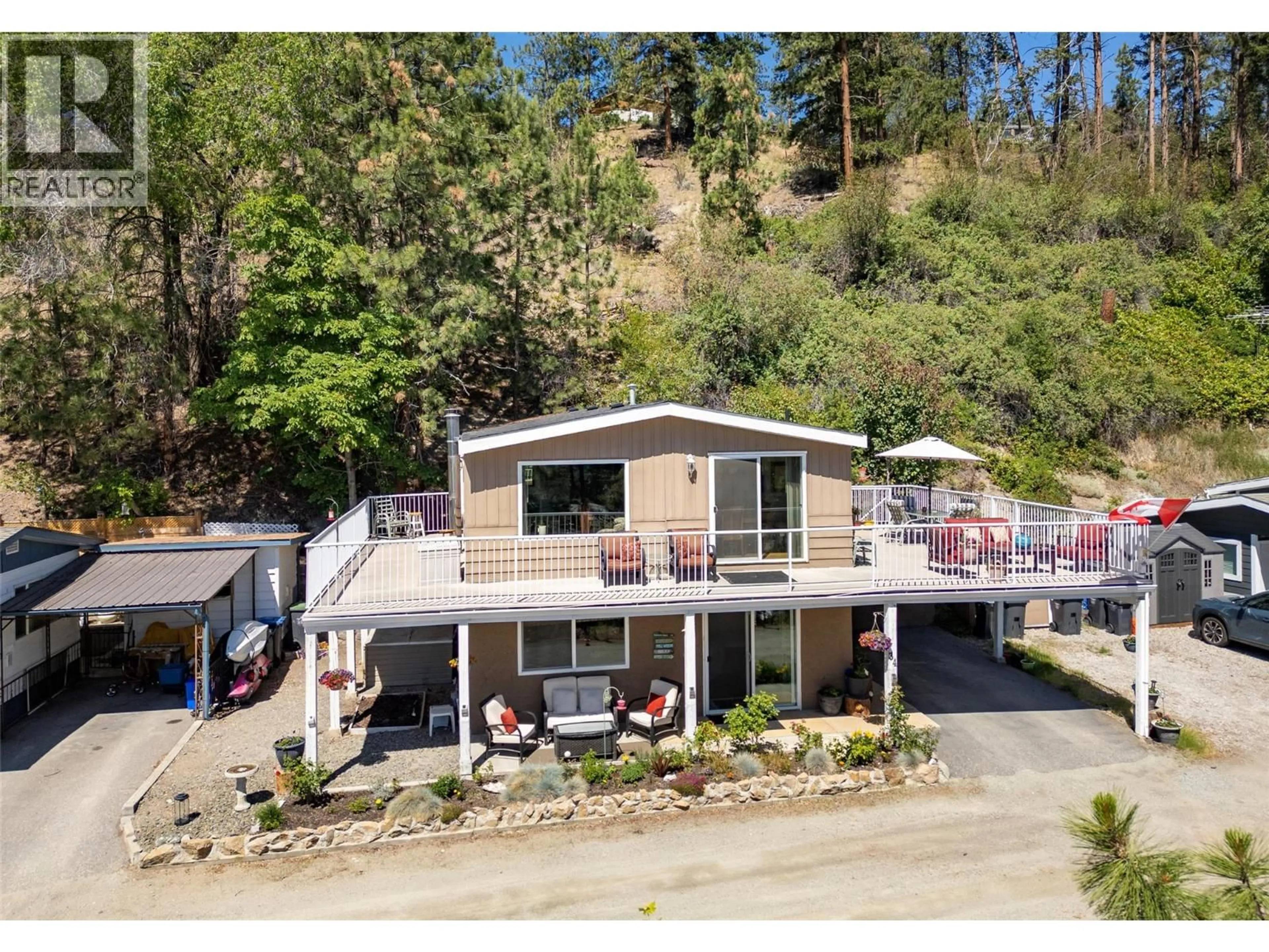 A pic from outside/outdoor area/front of a property/back of a property/a pic from drone, unknown for 34 - 6711 HIGHWAY 97 HIGHWAY, Peachland British Columbia V0H1X9