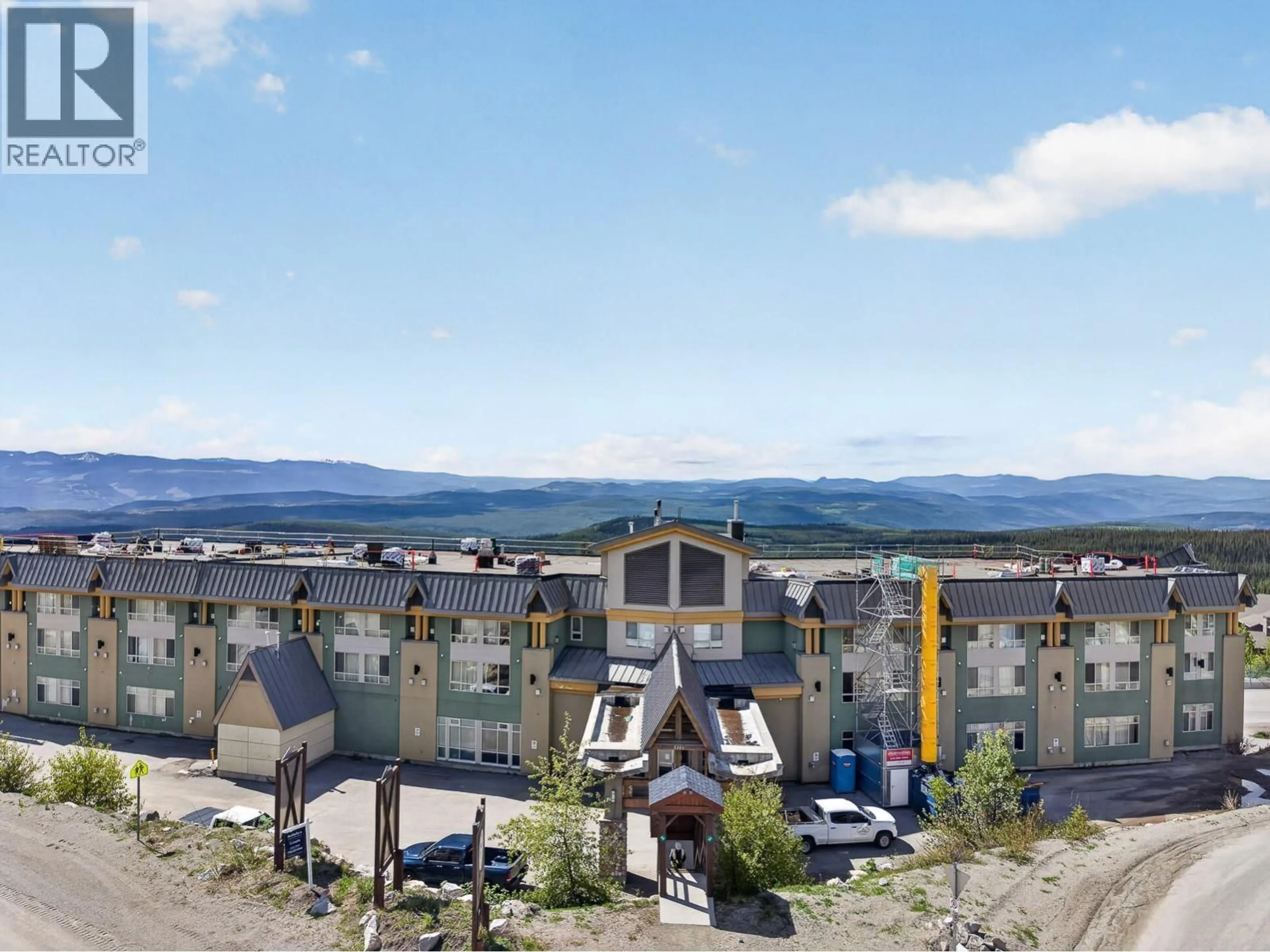 A pic from outside/outdoor area/front of a property/back of a property/a pic from drone, mountain view for 335 - 5340 BIG WHITE ROAD, Big White British Columbia V1P1P3