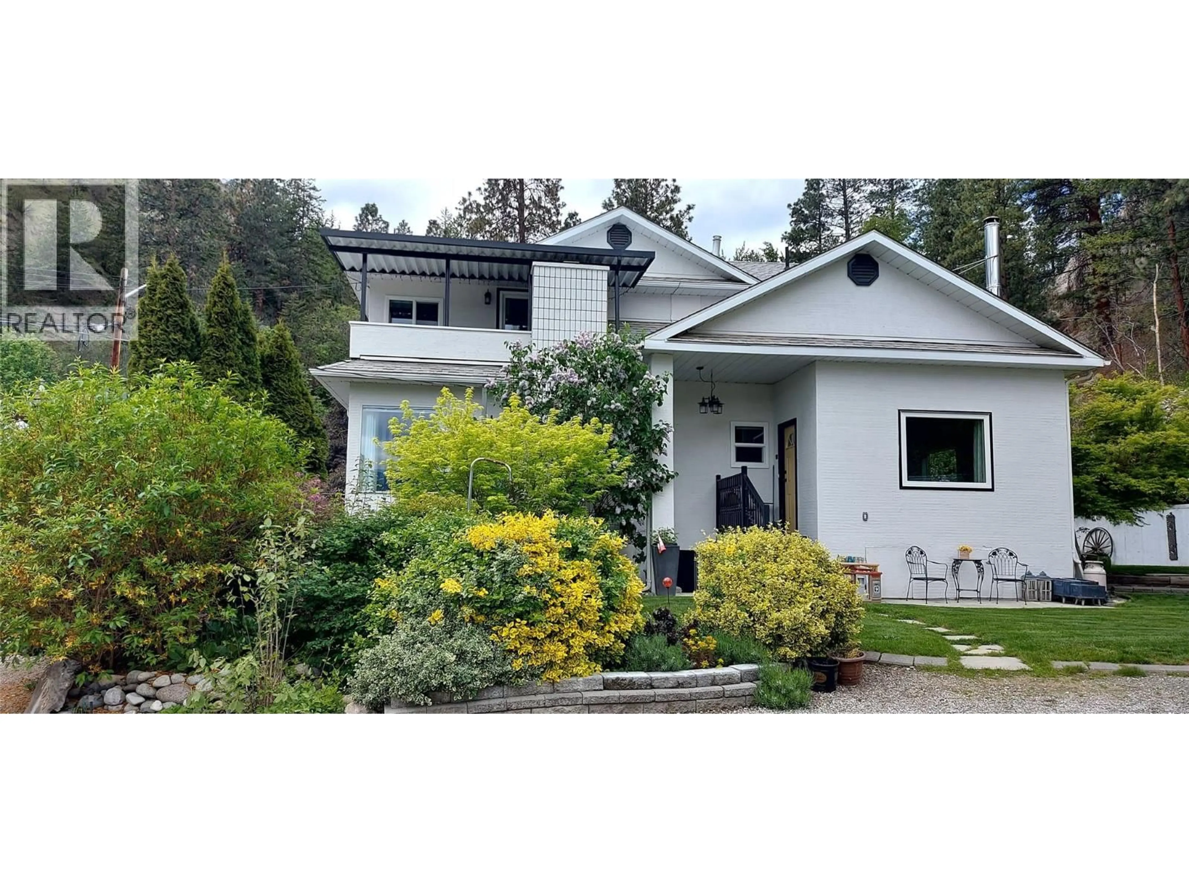 Home with vinyl exterior material, street for 5706 BUTLER STREET, Summerland British Columbia V0H1Z1