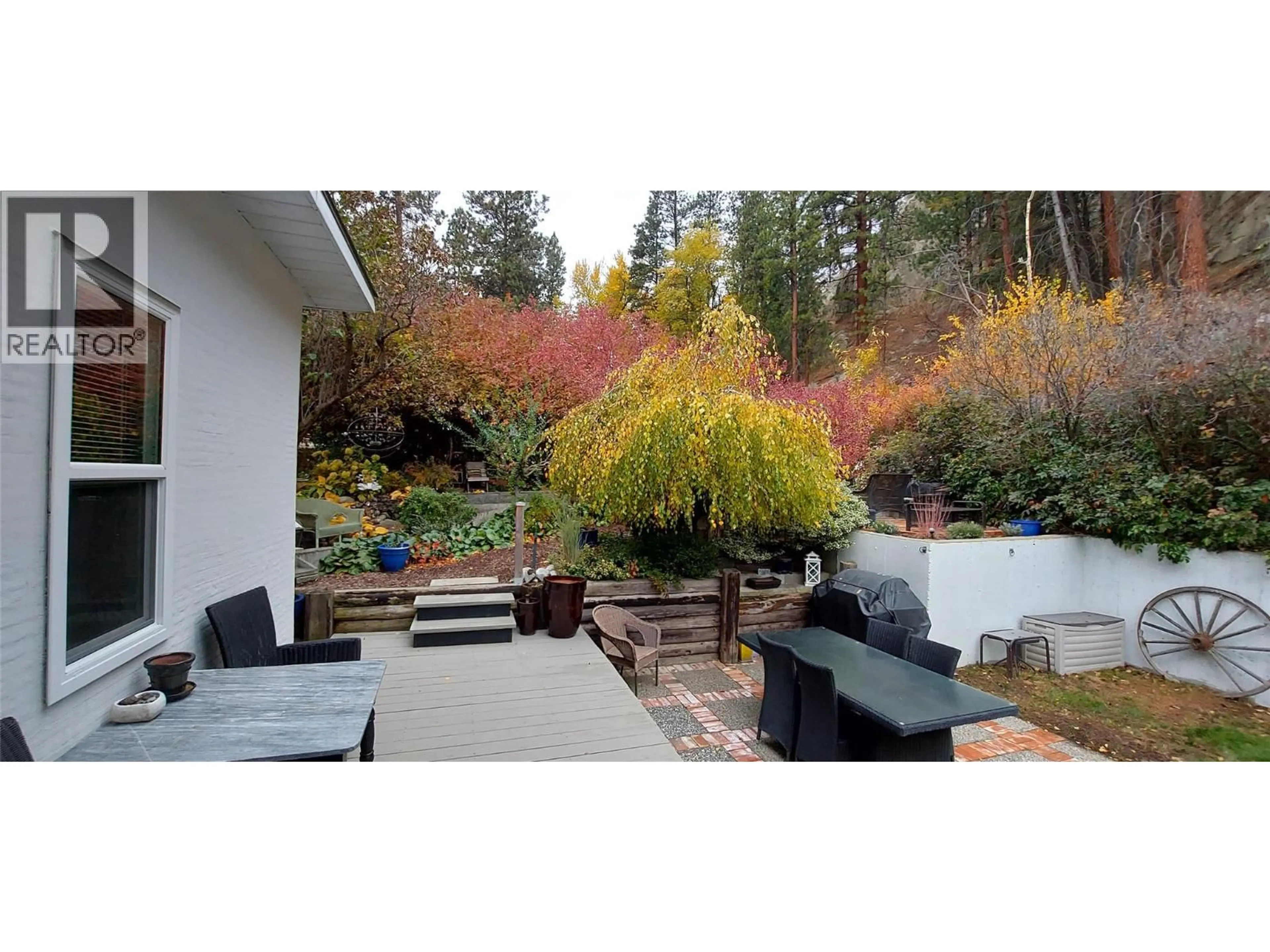 Patio, forest/trees view for 5706 BUTLER STREET, Summerland British Columbia V0H1Z1